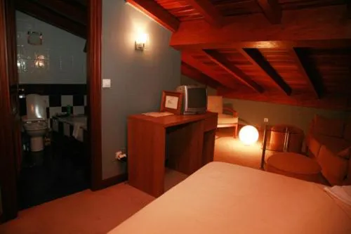 Photo of the whole room, Bed in Gran Hotel Rural Cela
