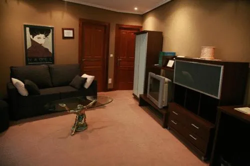 Living room in Gran Hotel Rural Cela