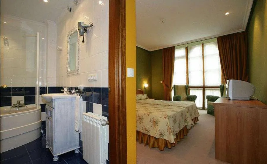 Photo of the whole room, Bed in Gran Hotel Rural Cela