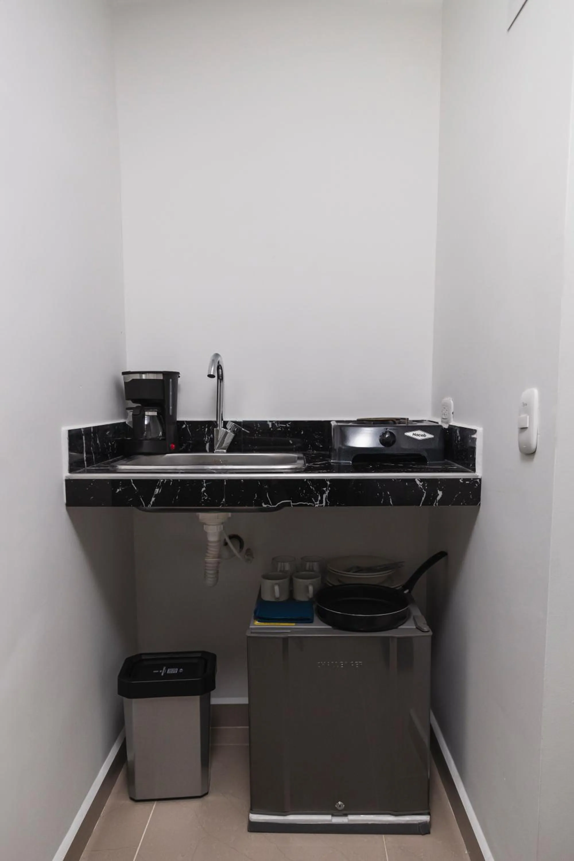 Kitchen or kitchenette in Hotel Boutique Business Center