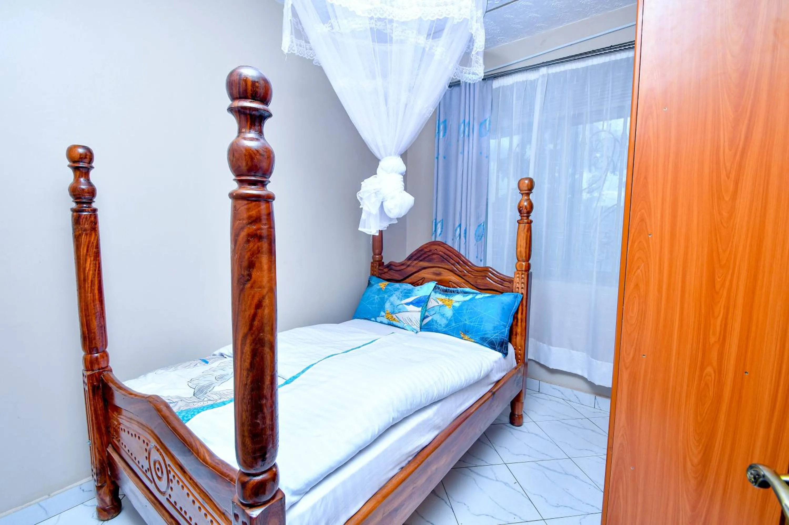 Bed in Peace of Mind Suites