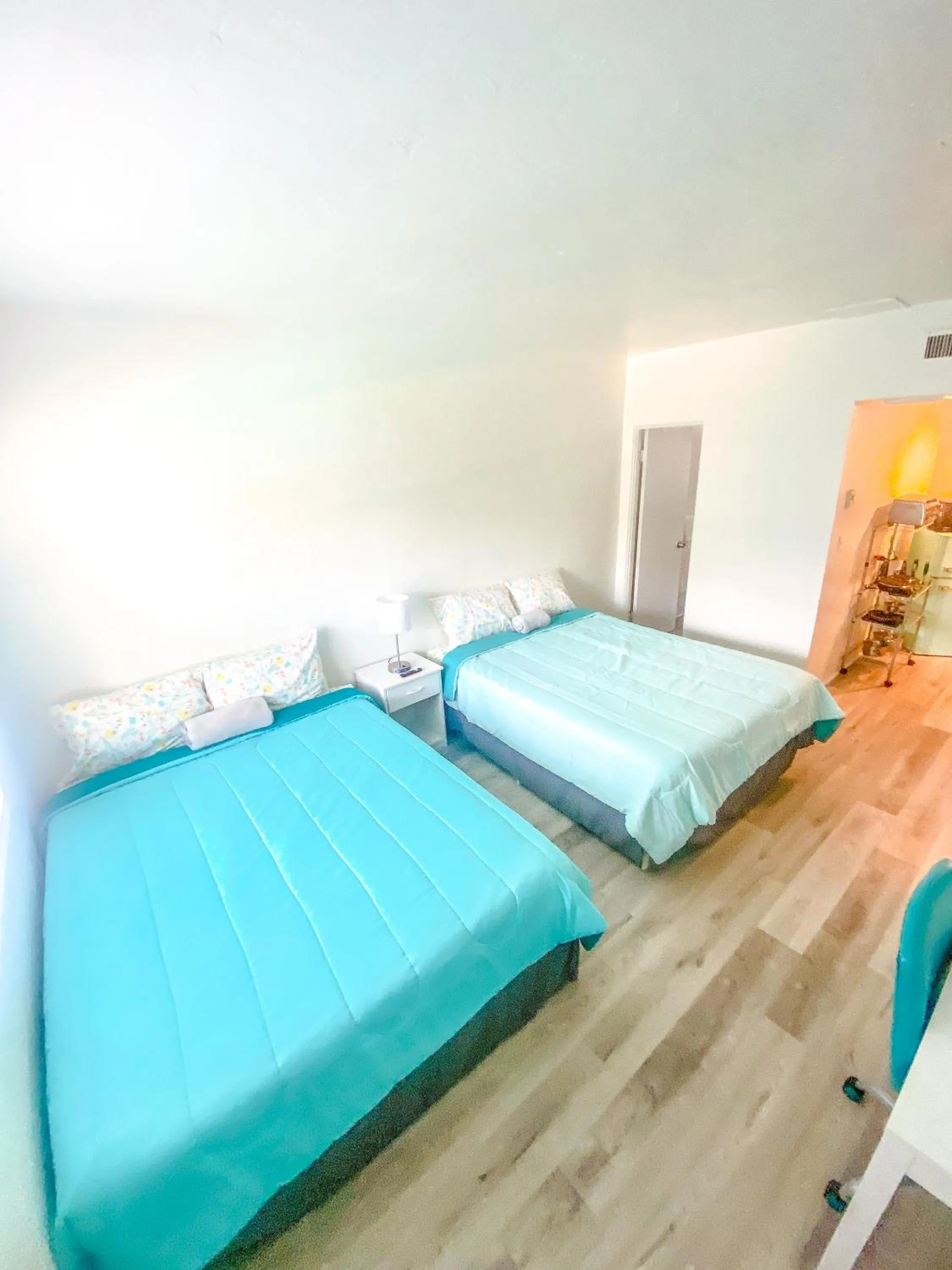 Bed in Uptown Inn & Suites