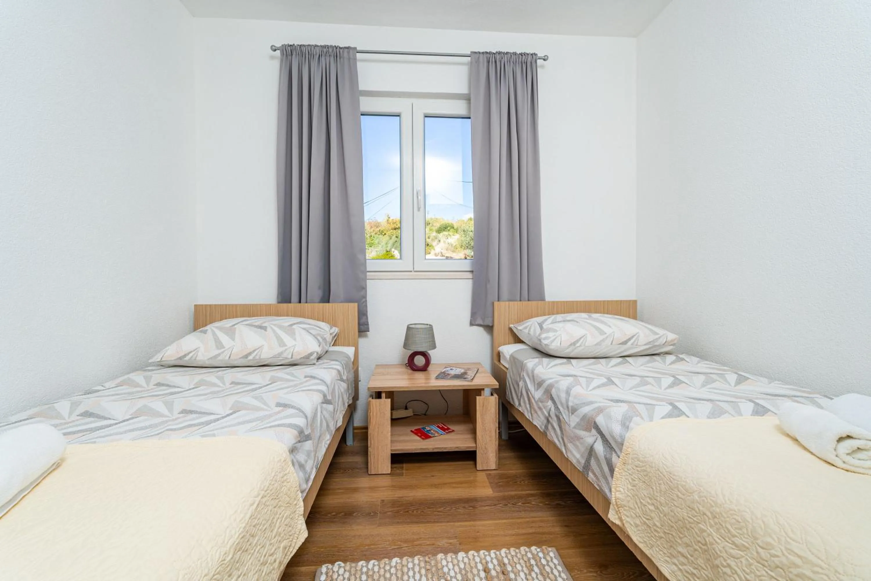 Bed in Sea View Apartment Nuncijata