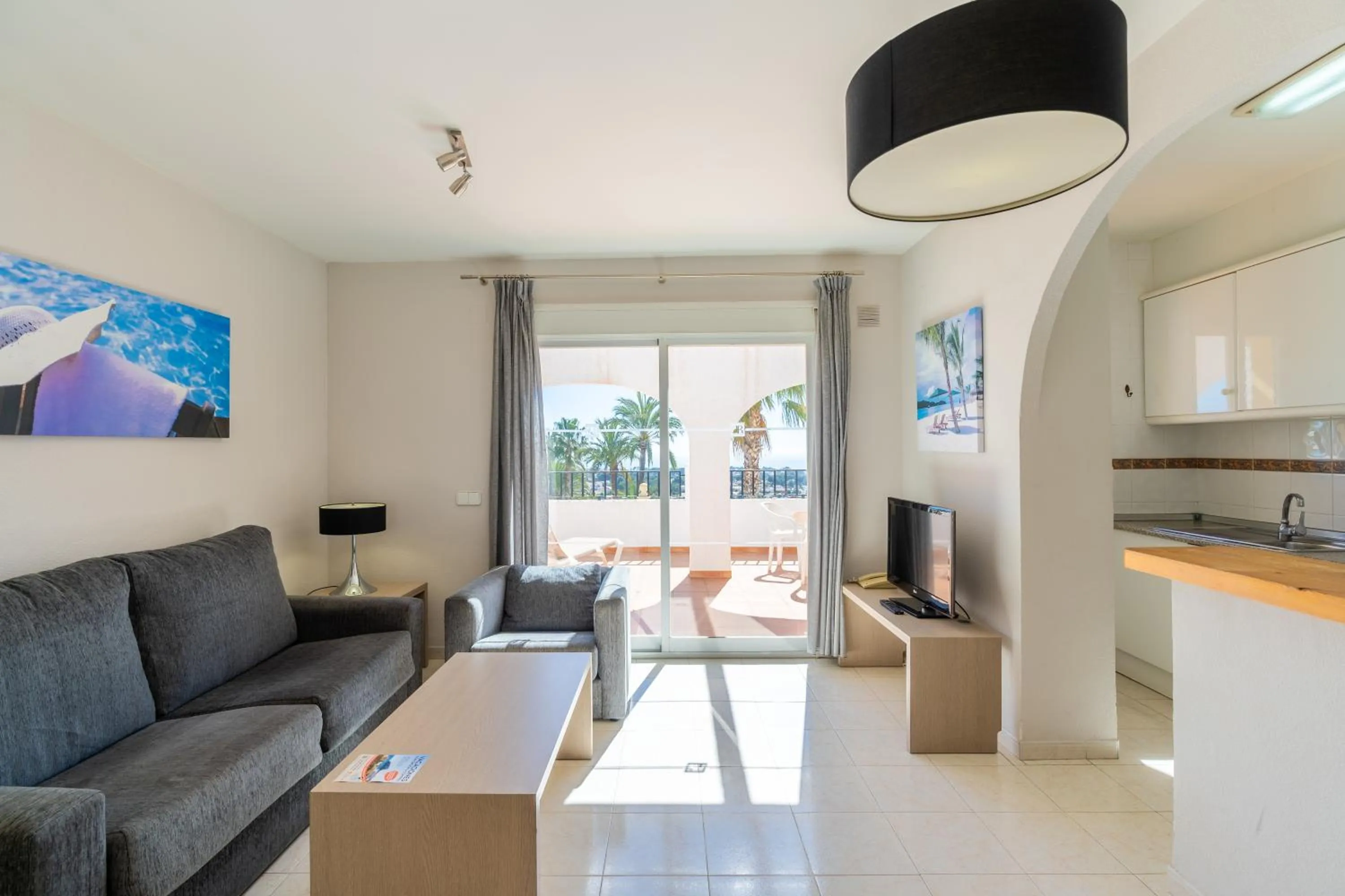 Living room in Bungalows Imperial Park Unitursa