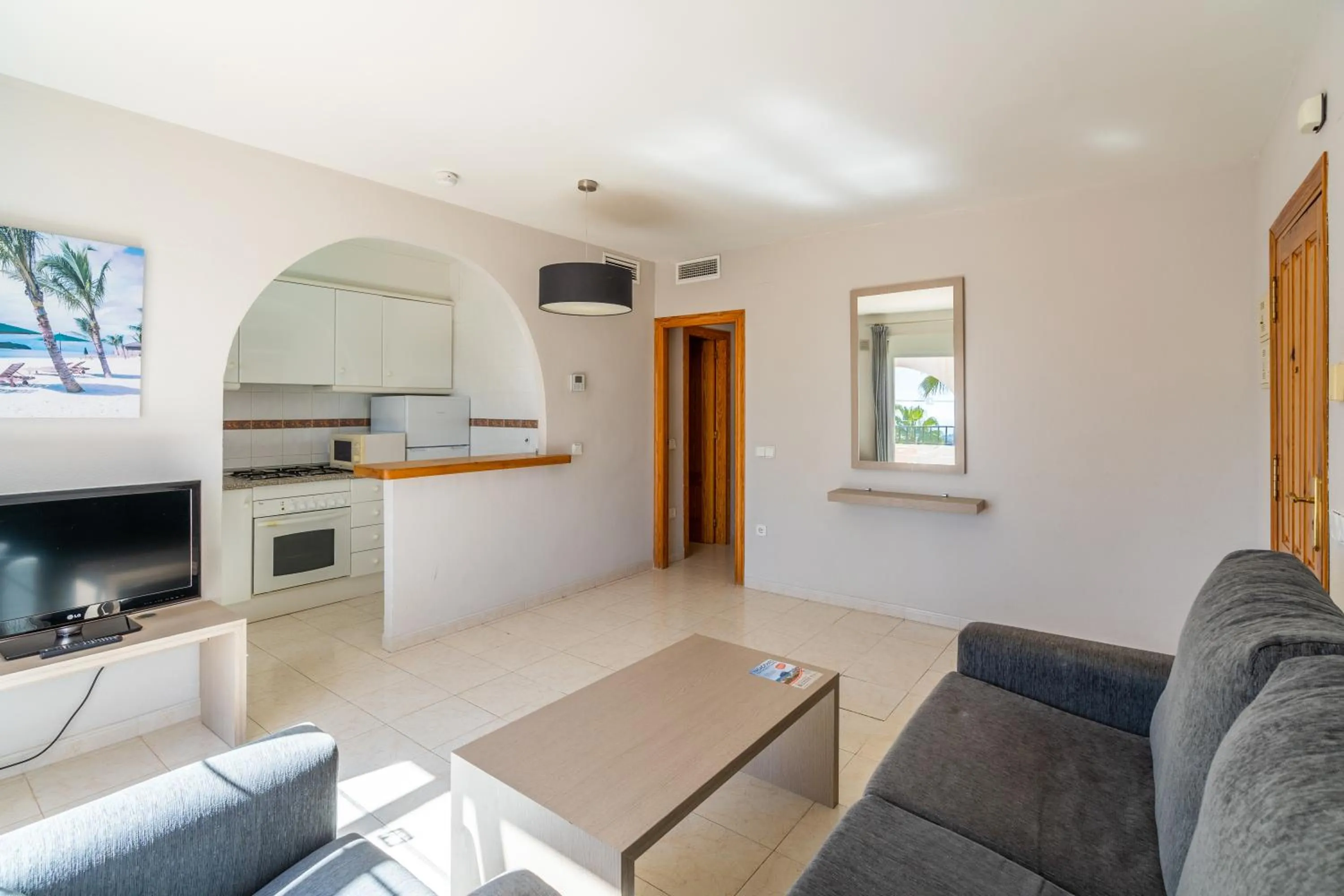 Living room in Bungalows Imperial Park Unitursa