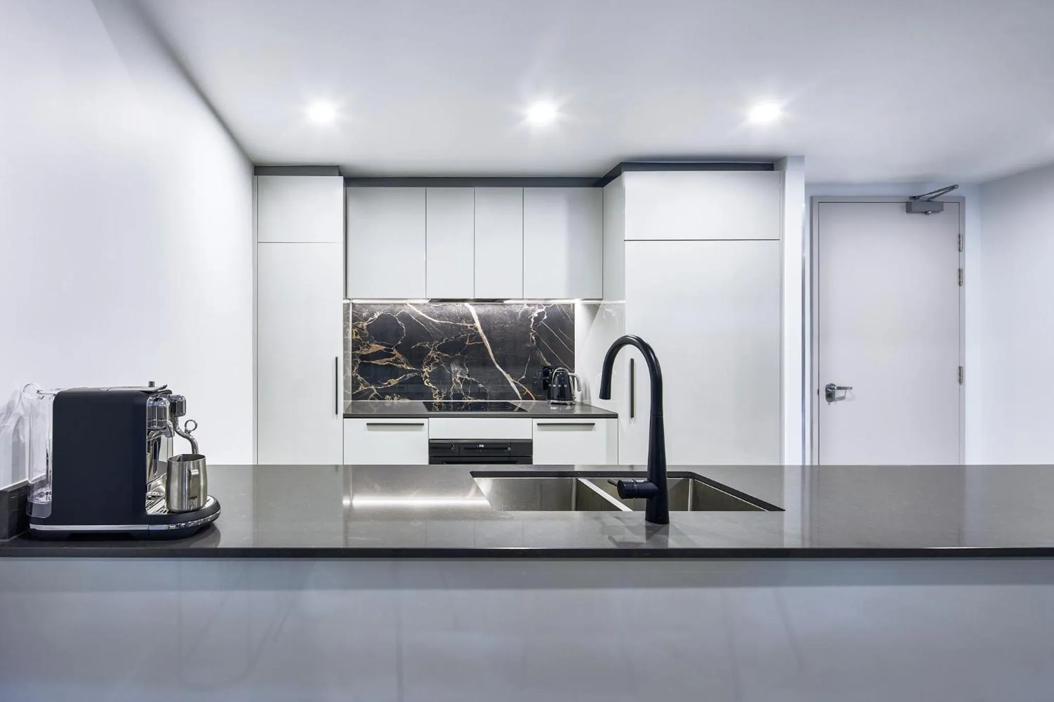 kitchen in Meriton Suites Canberra