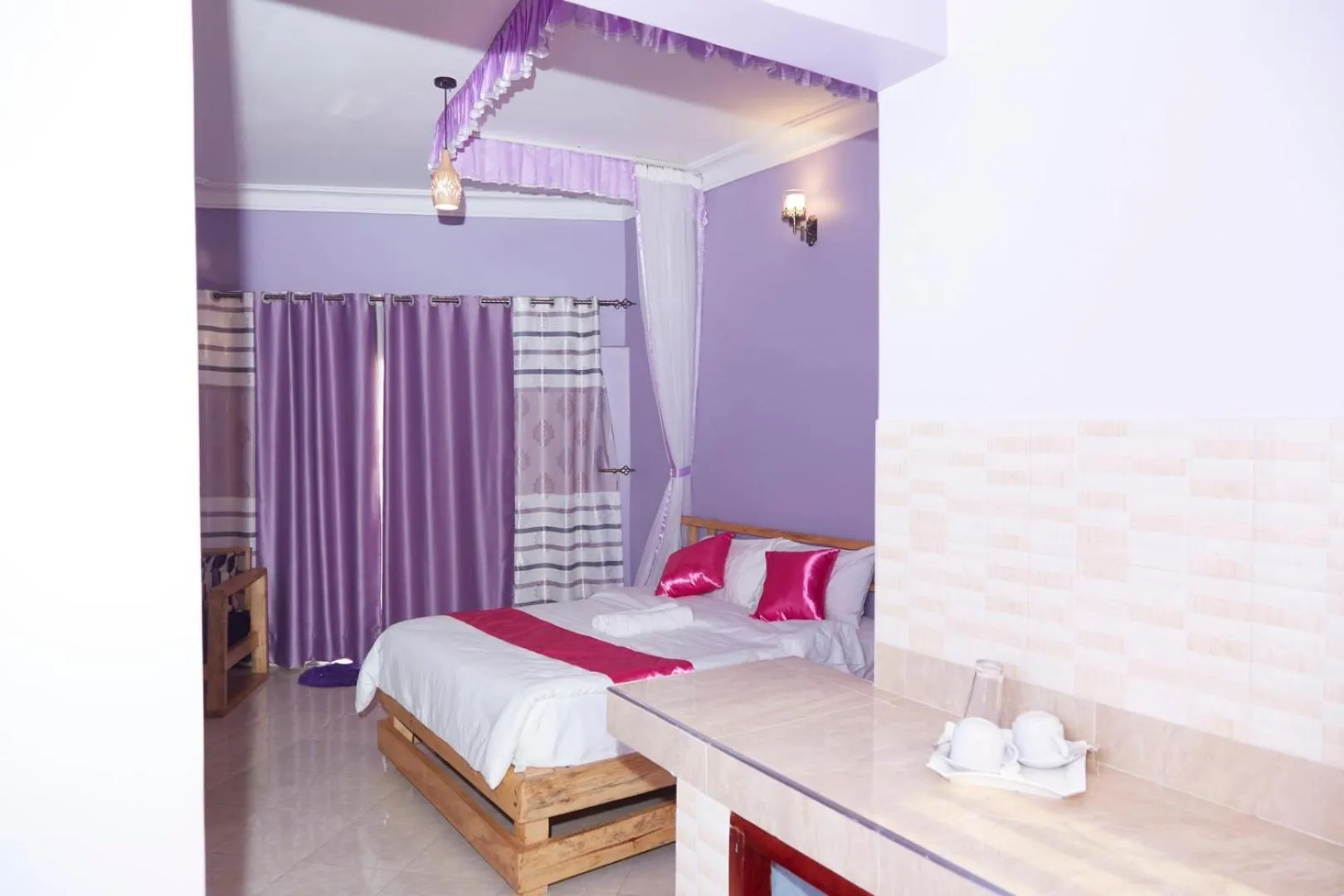 Bed in WestWay Luxury Suites