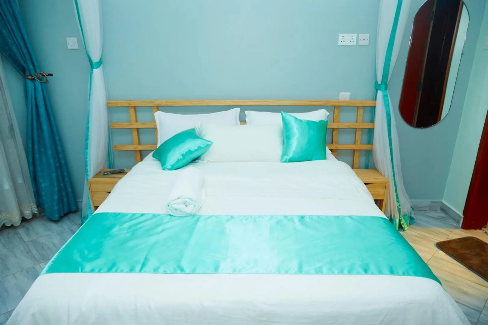 Bed in WestWay Luxury Suites