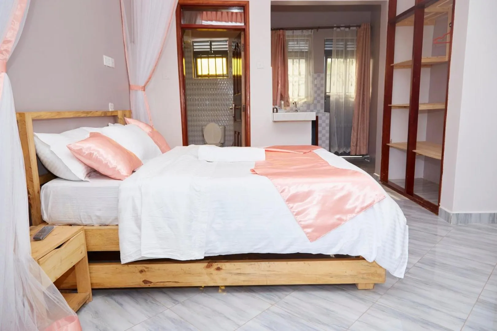 Bed in WestWay Luxury Suites