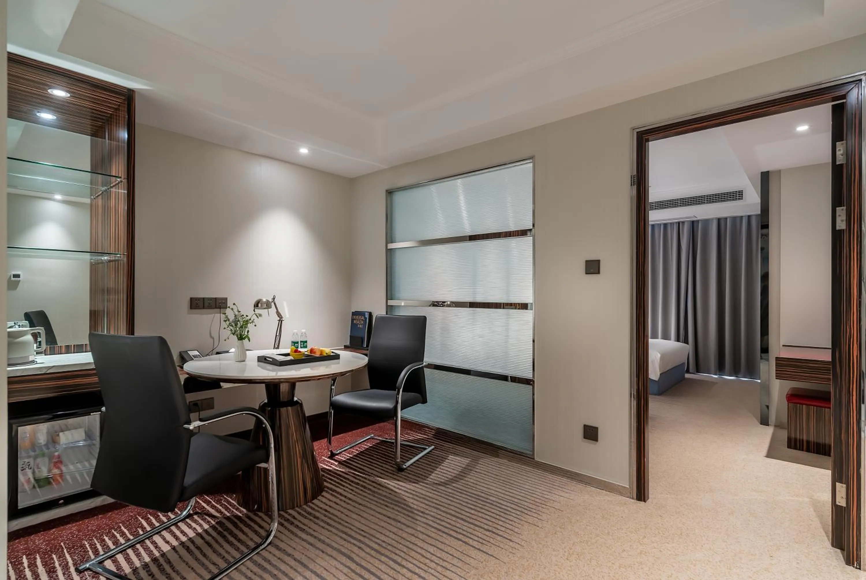 Living room in Suning Universal Hotel ALL-SUITES