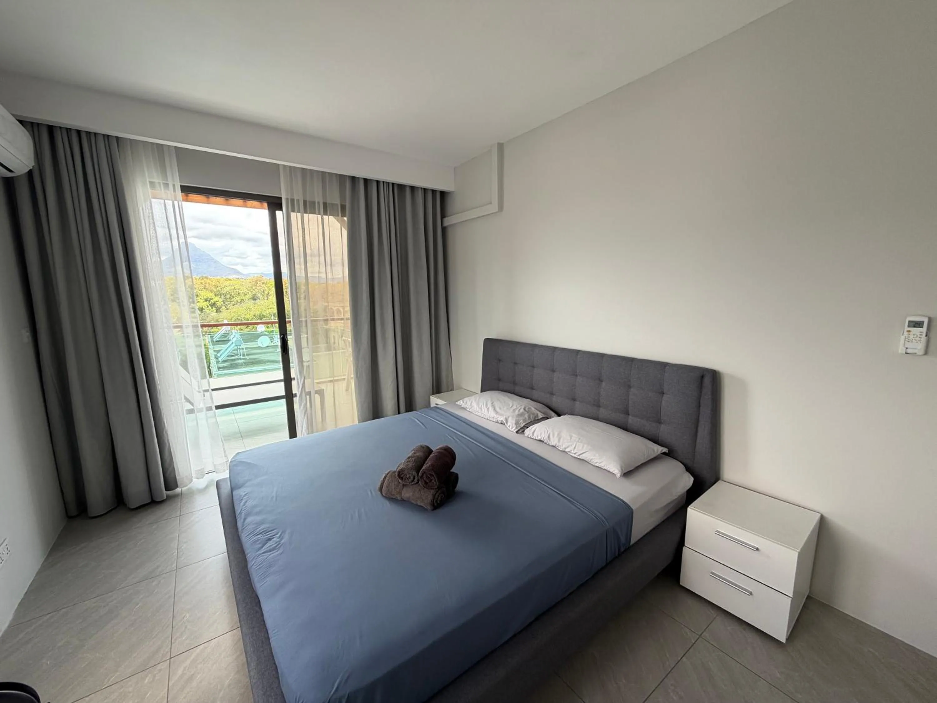 Bed in Top-Floor Modern 3BD Penthouse with Beautiful Mountain View Terrace - 5 min Walk to Beach