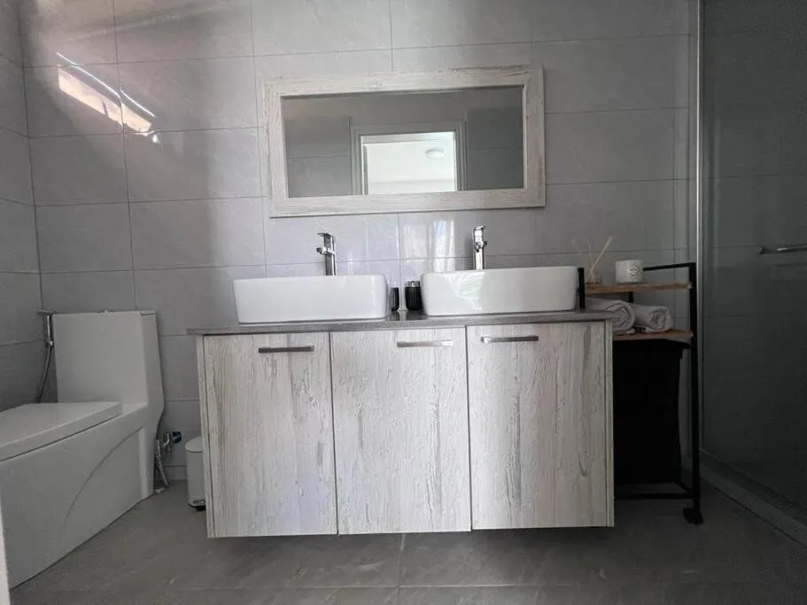 Toilet in Top-Floor Modern 3BD Penthouse with Beautiful Mountain View Terrace - 5 min Walk to Beach