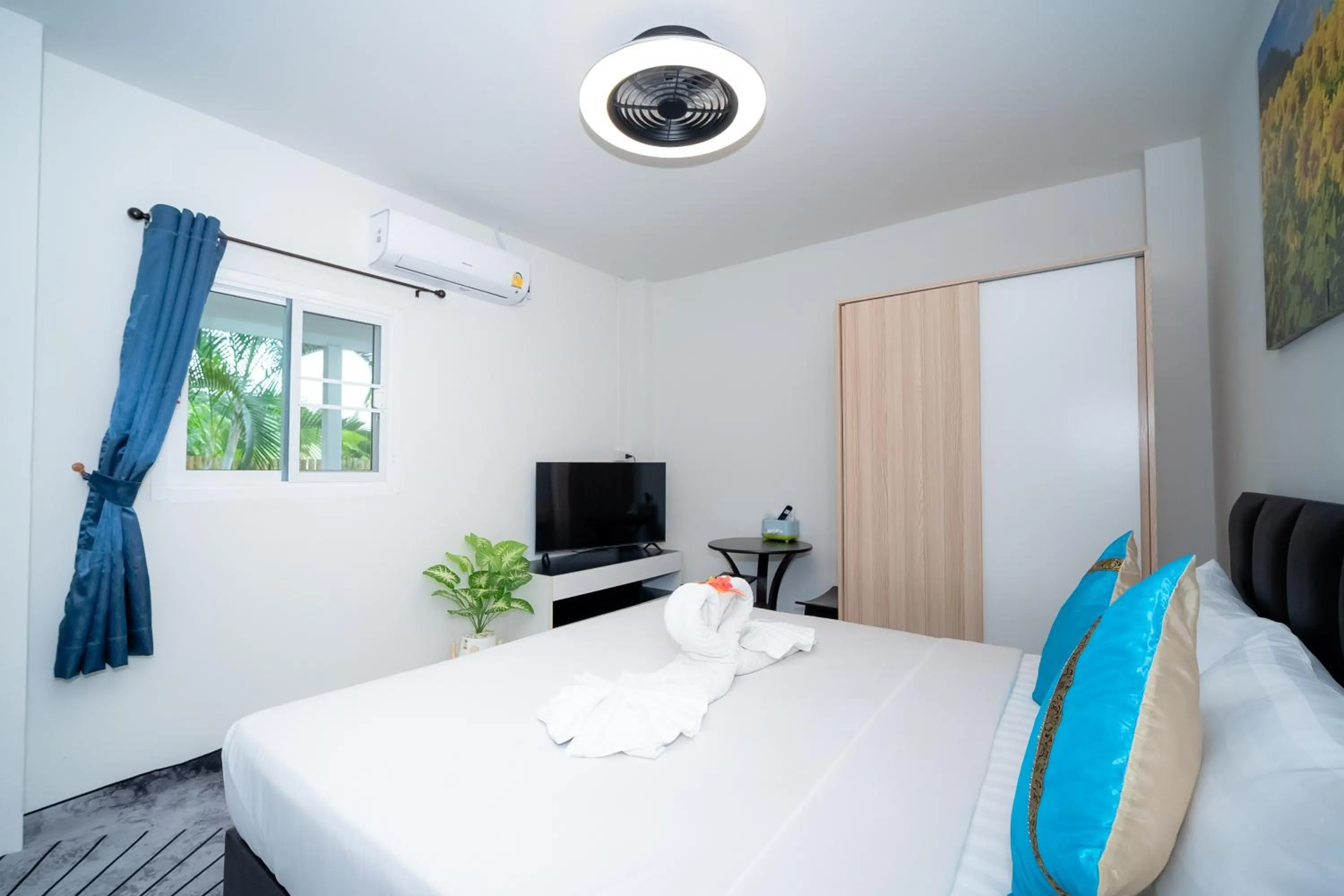 Bed in ฺBaan Waru seaview villa