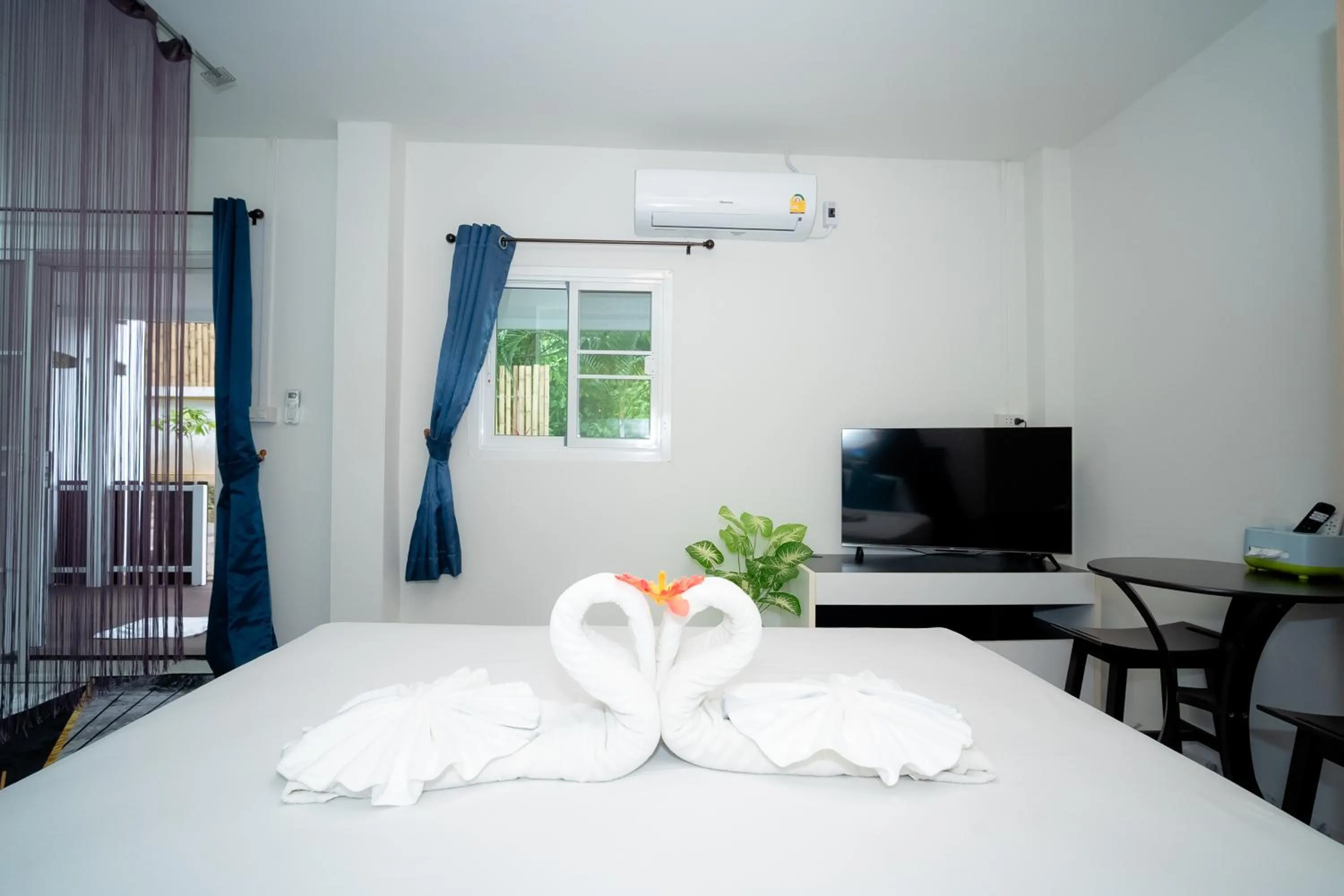 Bed in ฺBaan Waru seaview villa