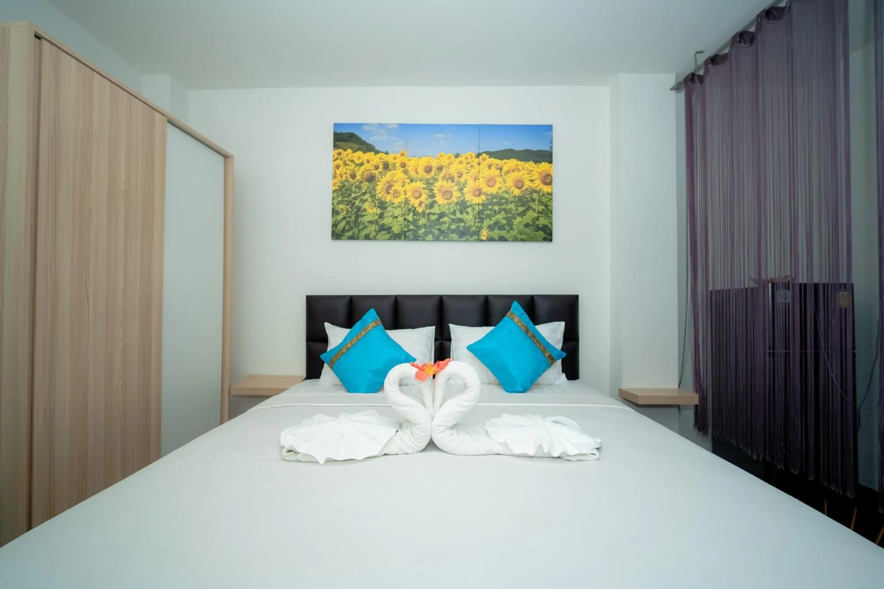 Bed in ฺBaan Waru seaview villa