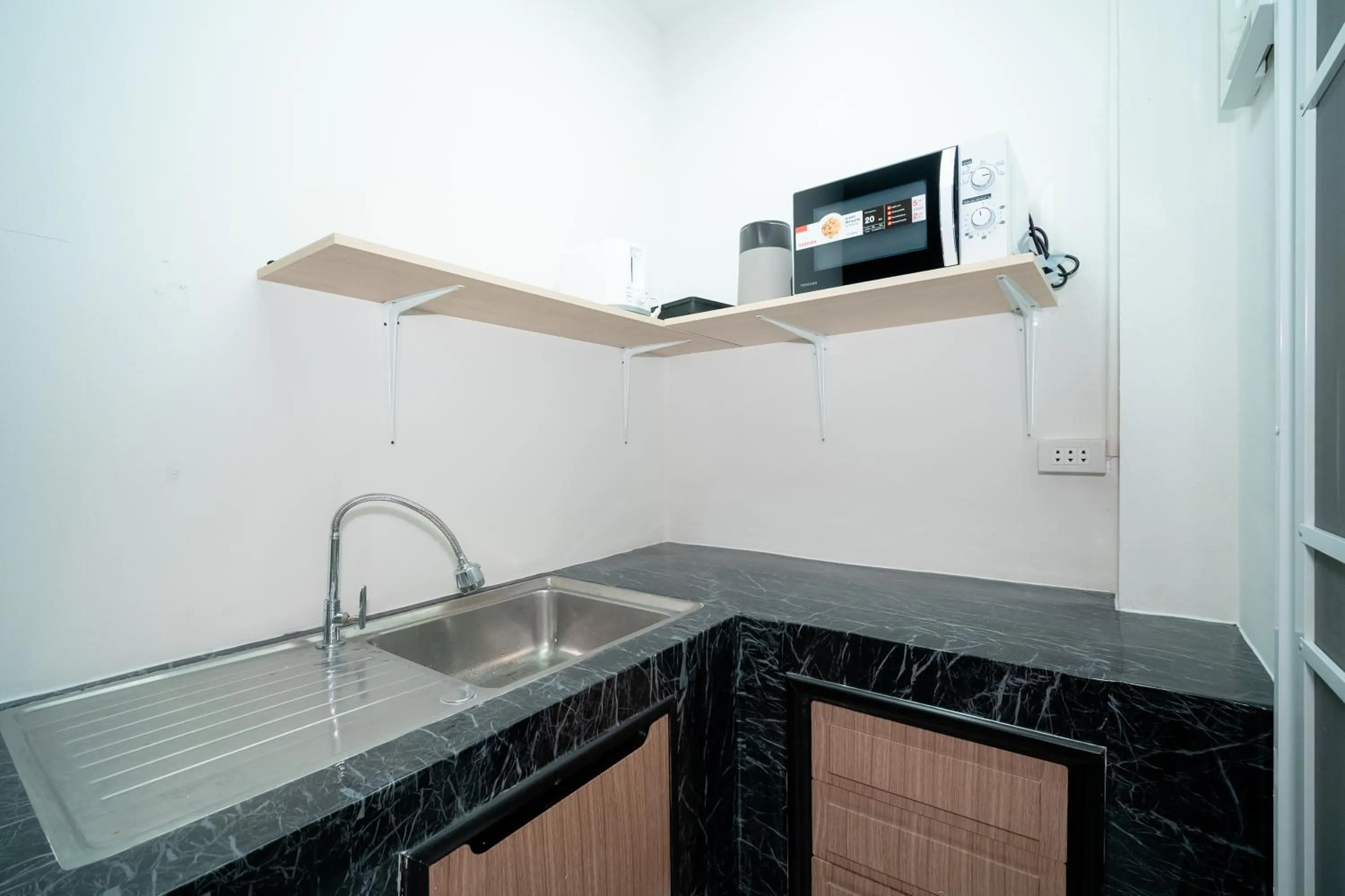 Kitchen or kitchenette in ฺBaan Waru seaview villa