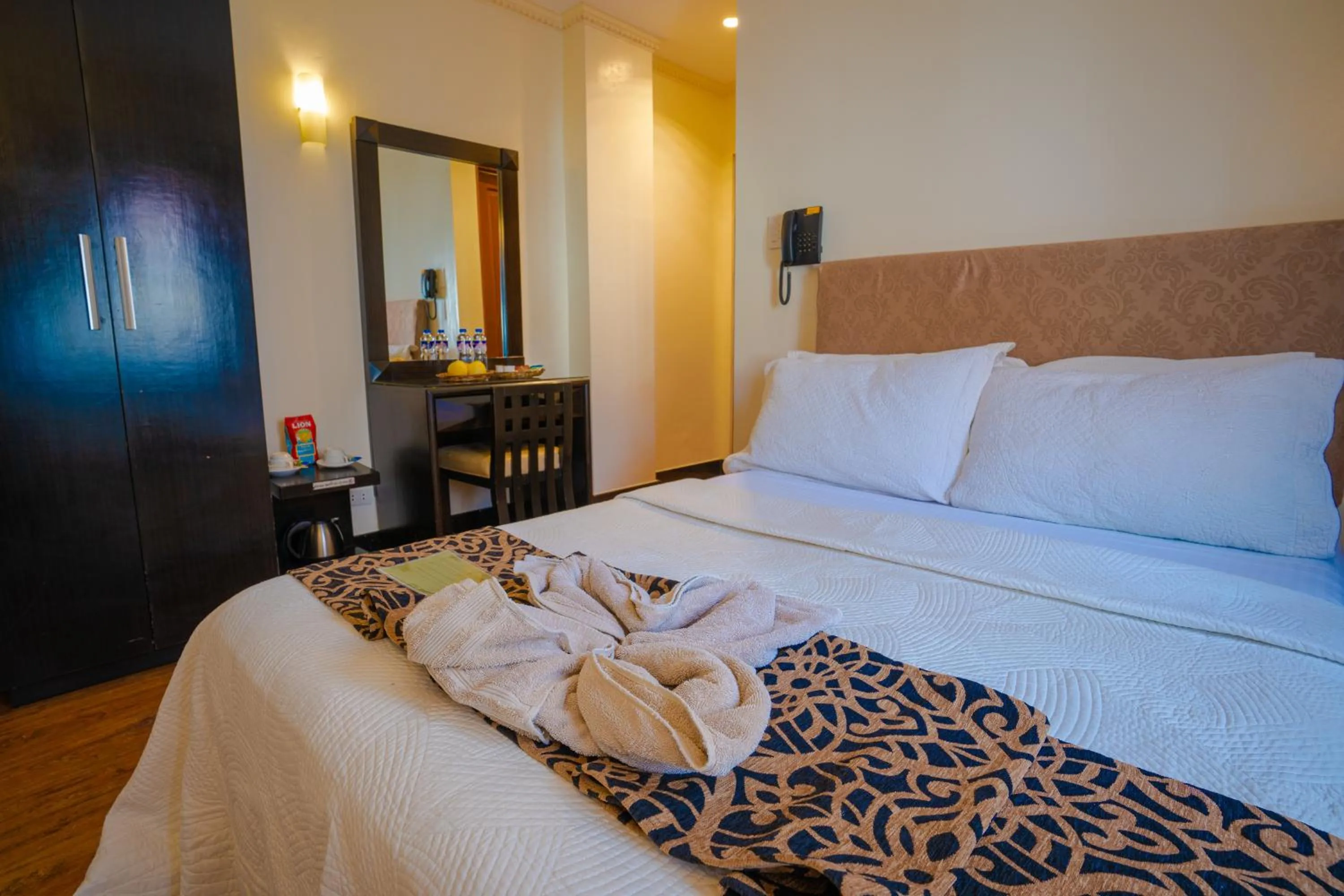 Bedroom, Bed in West Loch Park Hotel Vigan