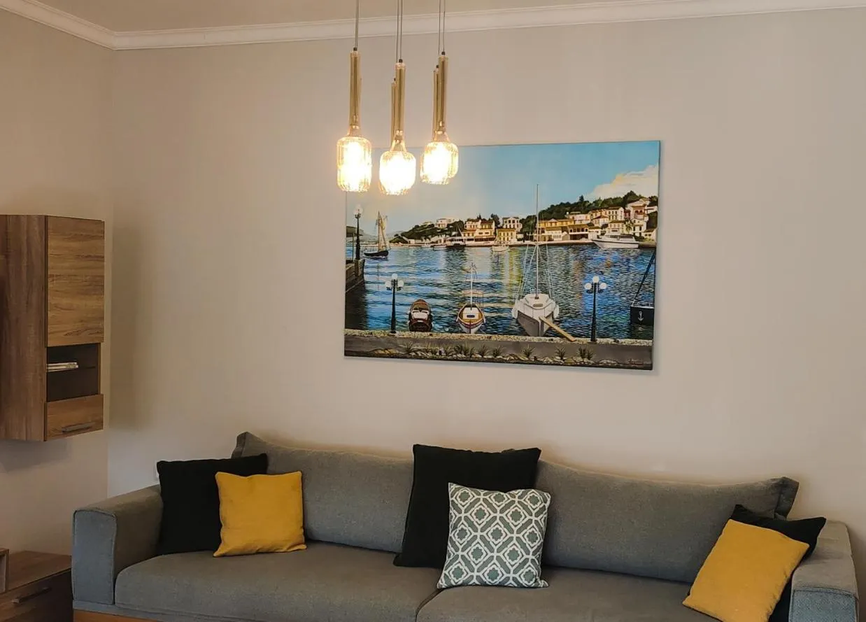 Living room in Pelagia Apartment by Kormaris