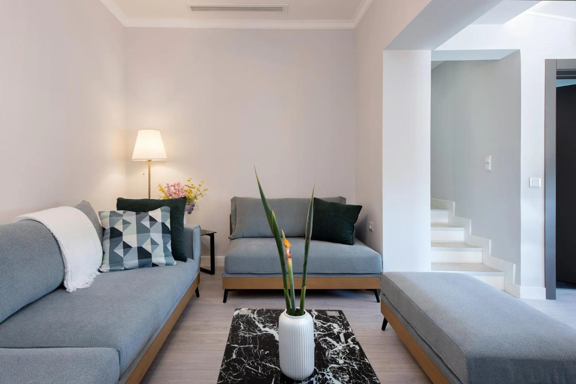 Living room in Pelagia Apartment by Kormaris