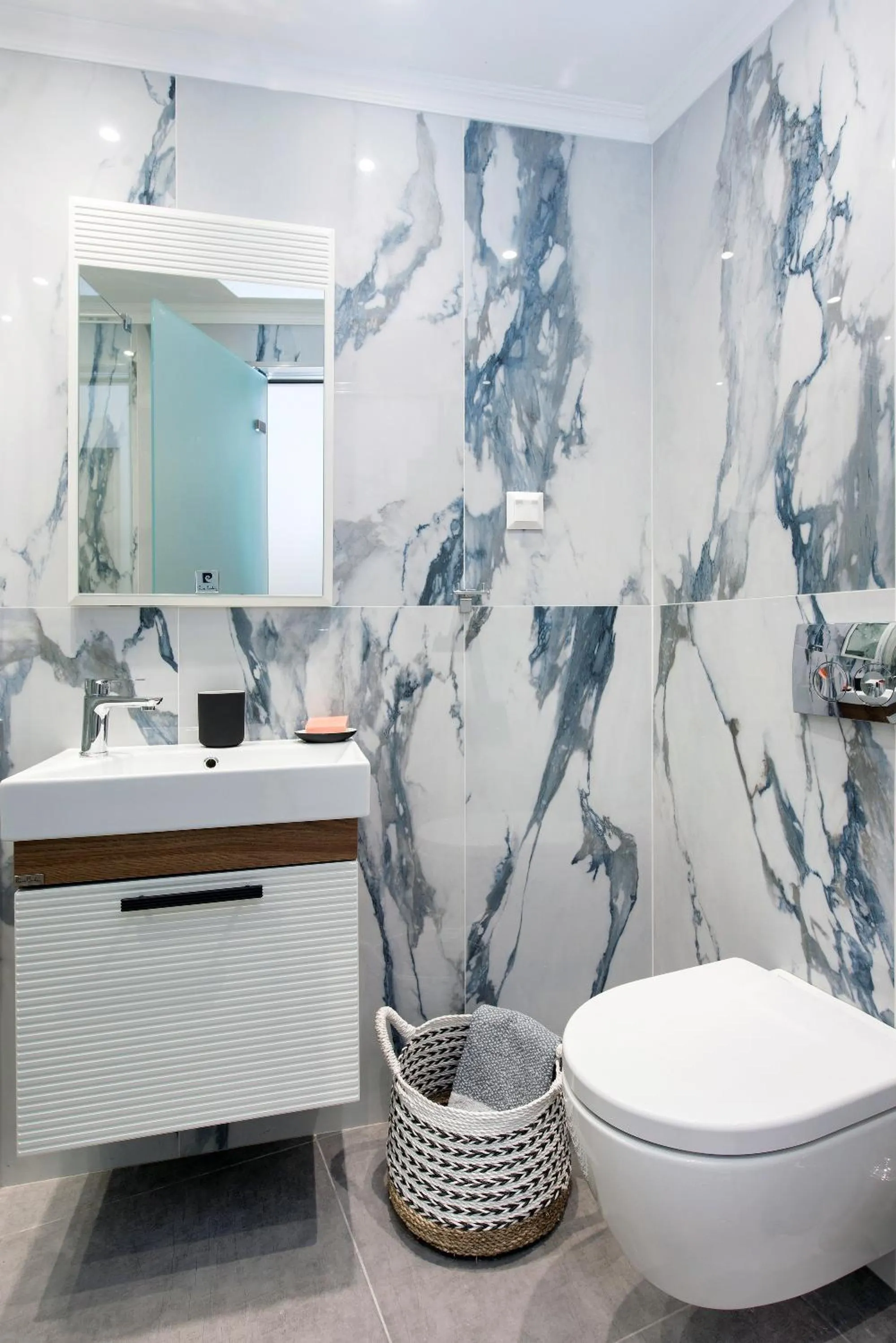 Bathroom in Pelagia Apartment by Kormaris