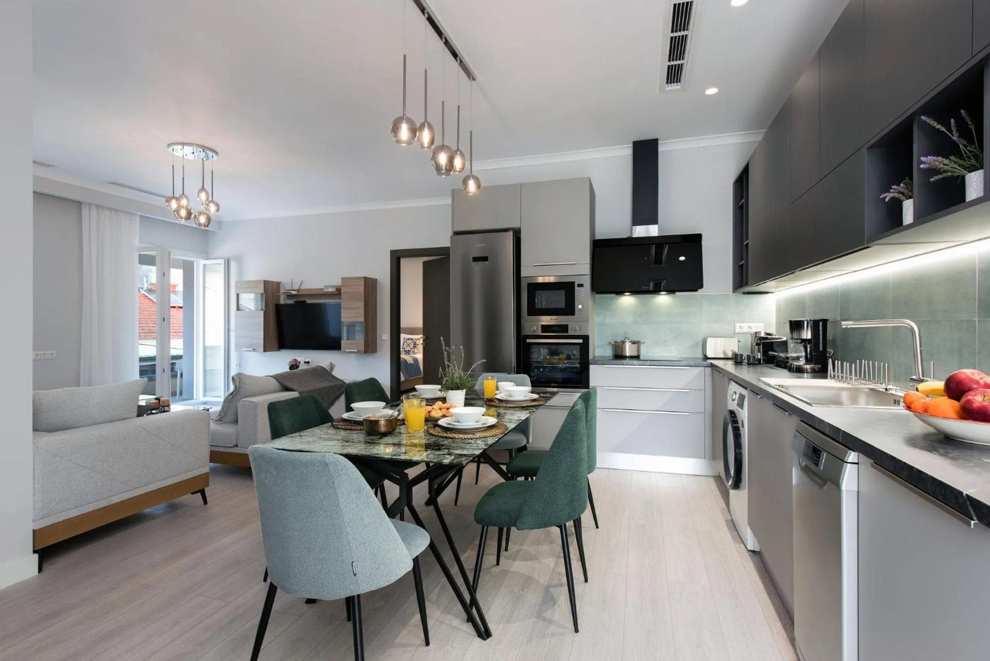 Kitchen or kitchenette in Pelagia Apartment by Kormaris