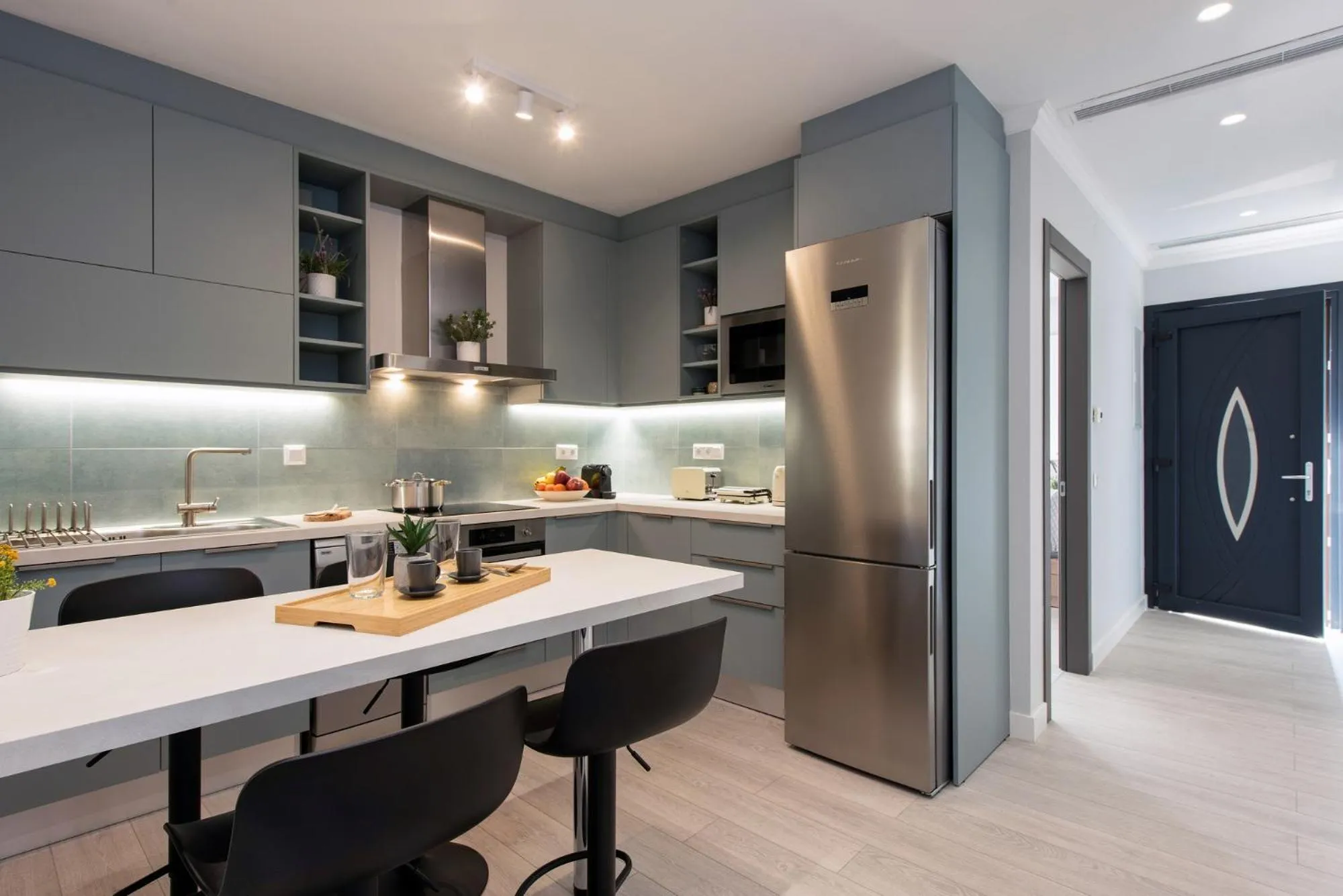 Kitchen or kitchenette in Pelagia Apartment by Kormaris