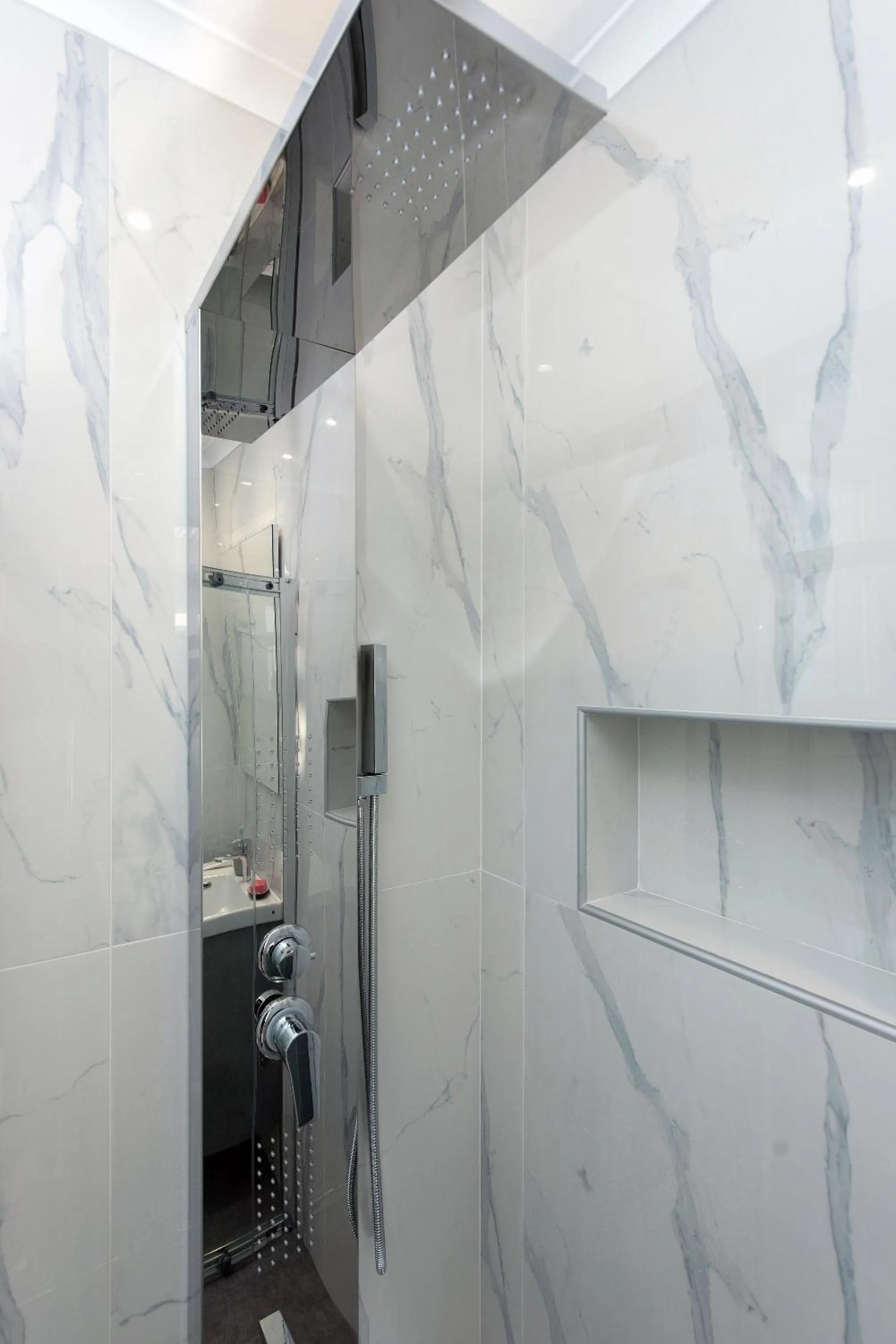 Shower in Pelagia Apartment by Kormaris