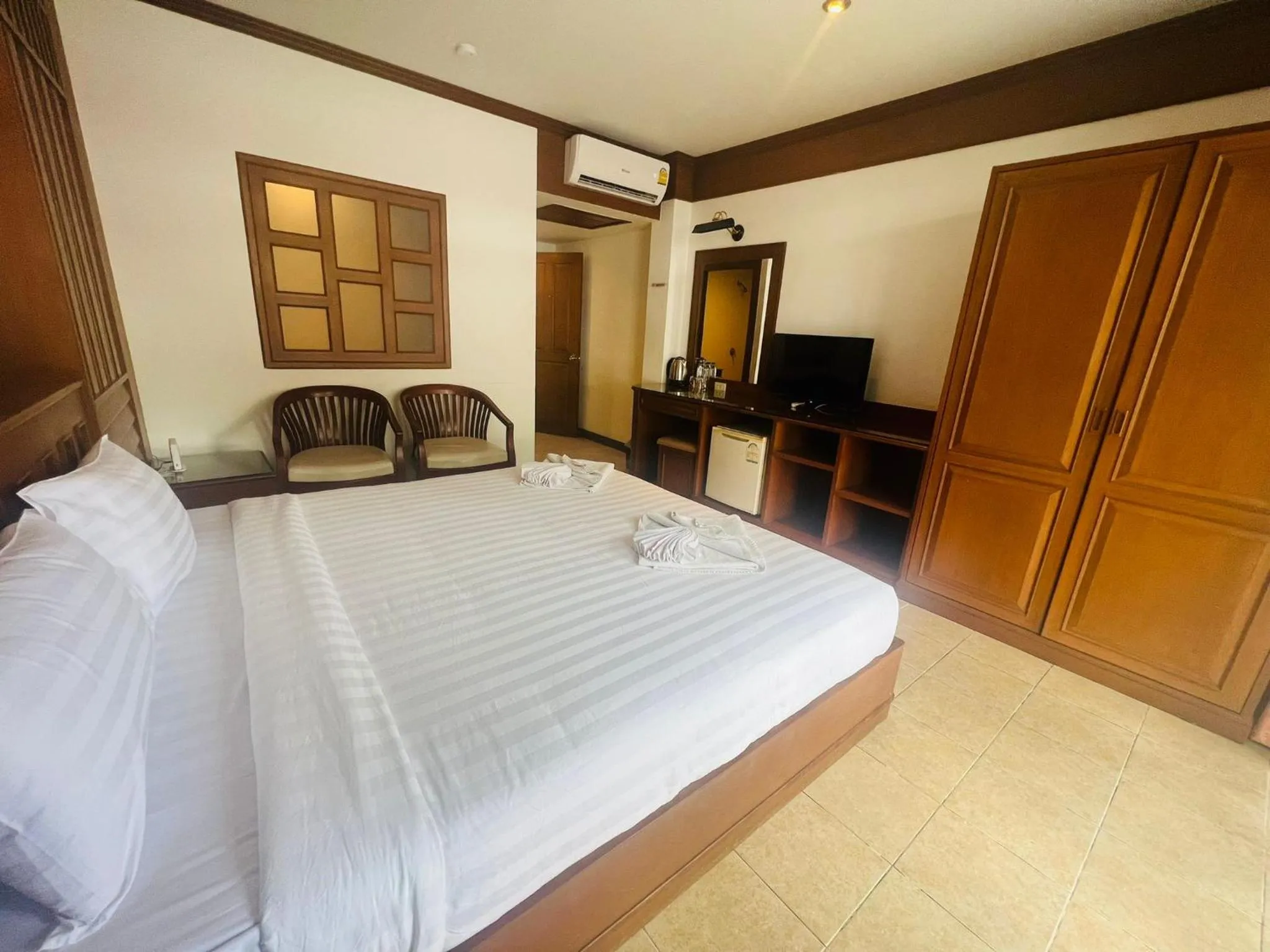 Bed in Talya Patong Hotel