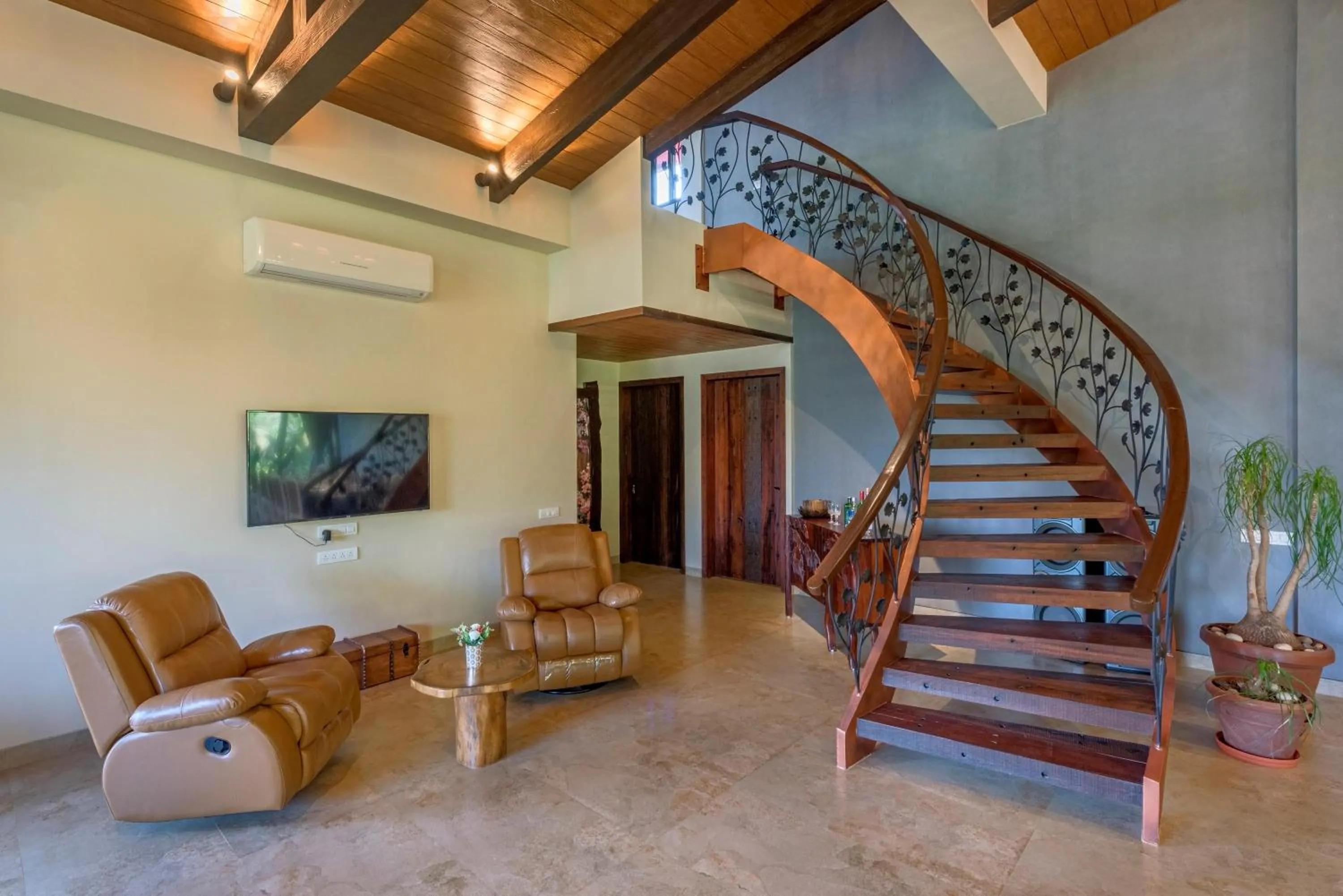 TV and multimedia in SaffronStays Althea - 4BR veg-only luxury villa with pool, jacuzzis, gourmet meals and Lohagad-Pawna lake views