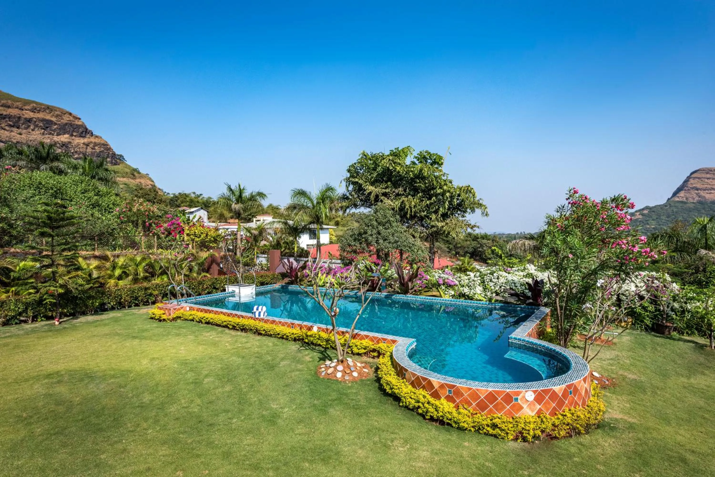 Natural landscape in SaffronStays Althea - 4BR veg-only luxury villa with pool, jacuzzis, gourmet meals and Lohagad-Pawna lake views