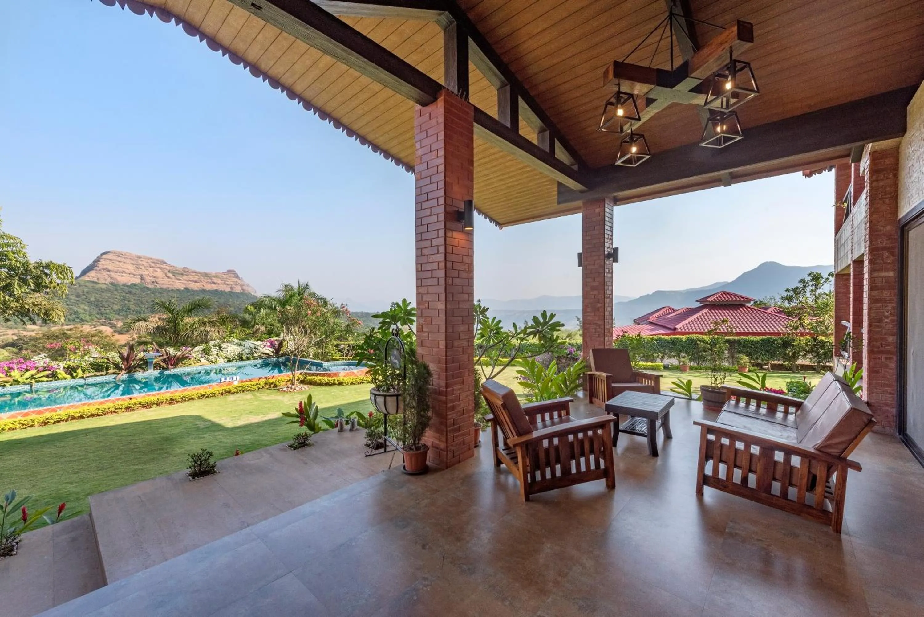 Day in SaffronStays Althea - 4BR veg-only luxury villa with pool, jacuzzis, gourmet meals and Lohagad-Pawna lake views