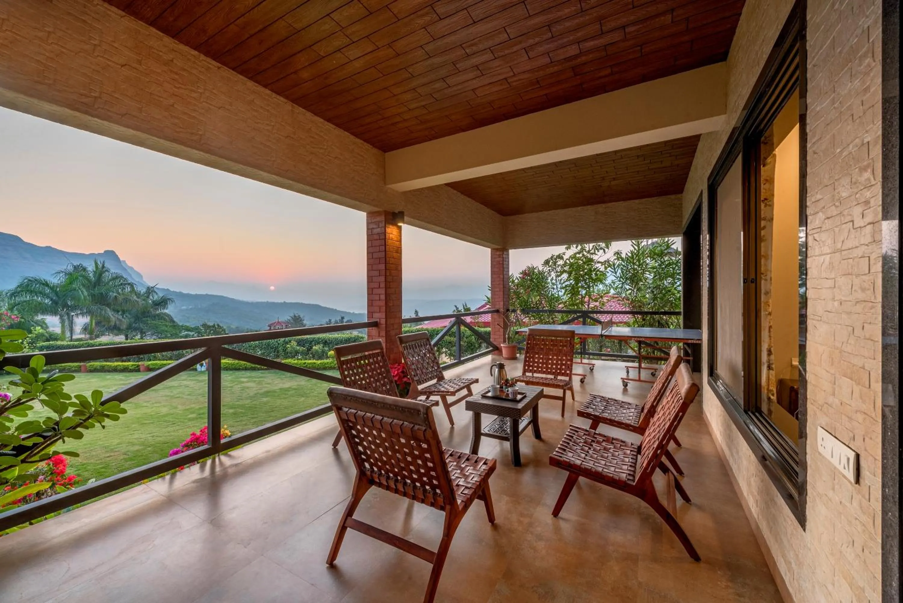 Patio in SaffronStays Althea - 4BR veg-only luxury villa with pool, jacuzzis, gourmet meals and Lohagad-Pawna lake views