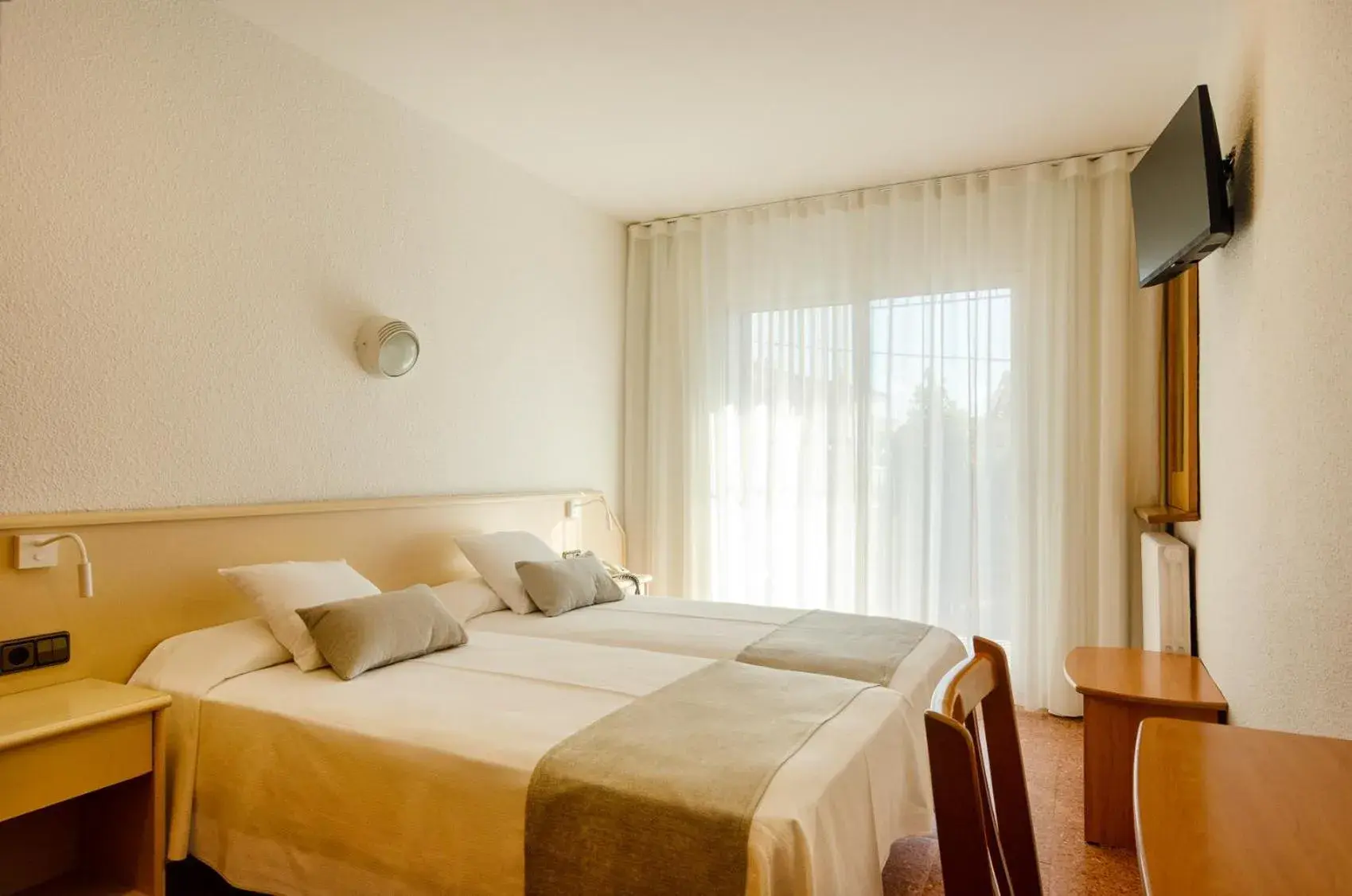 Bed in Hotel Medes II Bed in Hotel Medes II