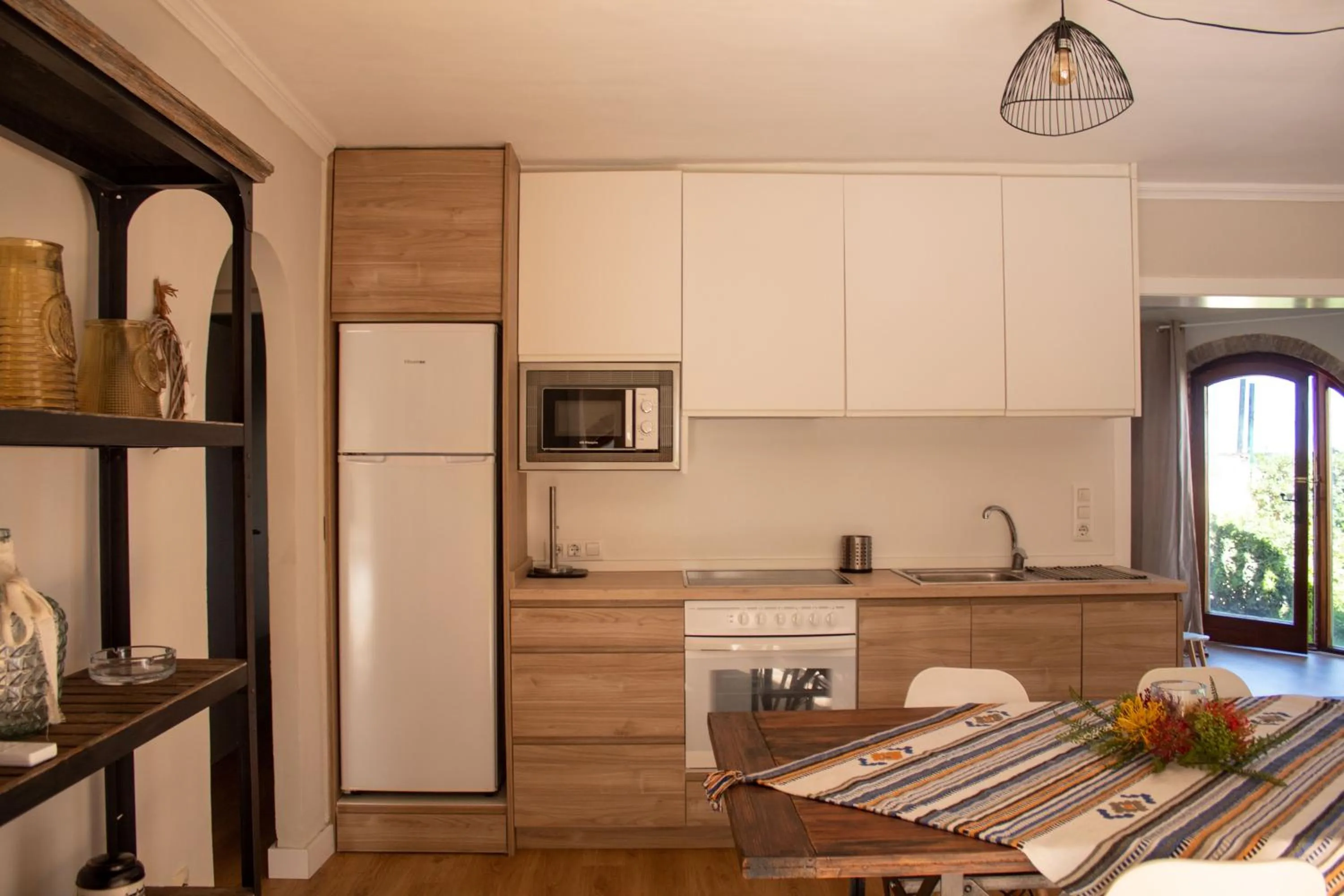 Kitchen or kitchenette in MR Hotelet de la Raconà & Apartments