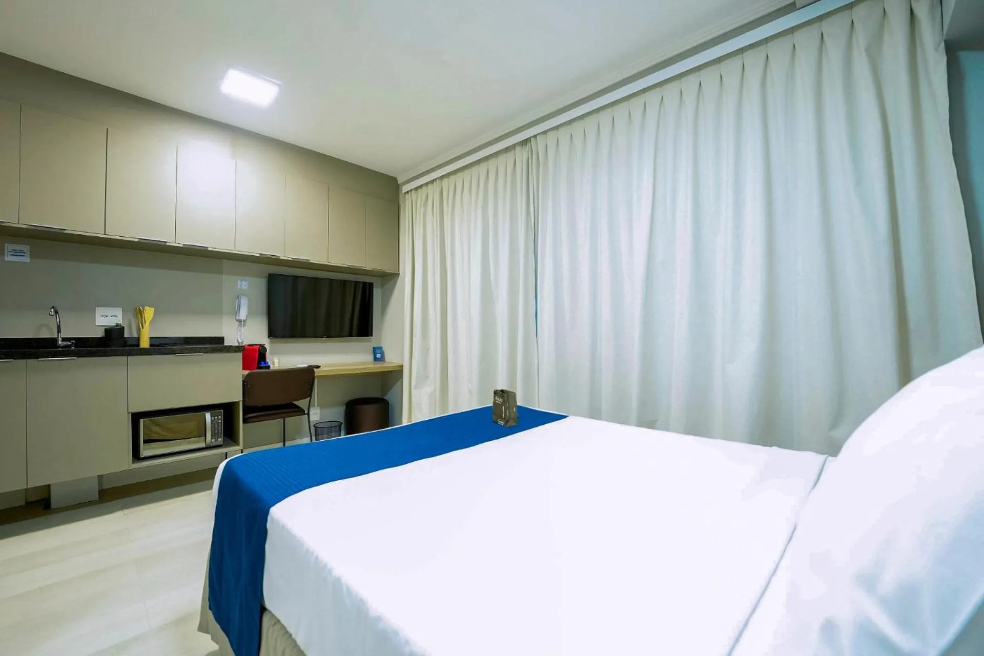 Photo of the whole room, Bed in Apartamentos Studio Allure Moema - Com café da manhã e Valet opcional, Recepção 24 horas