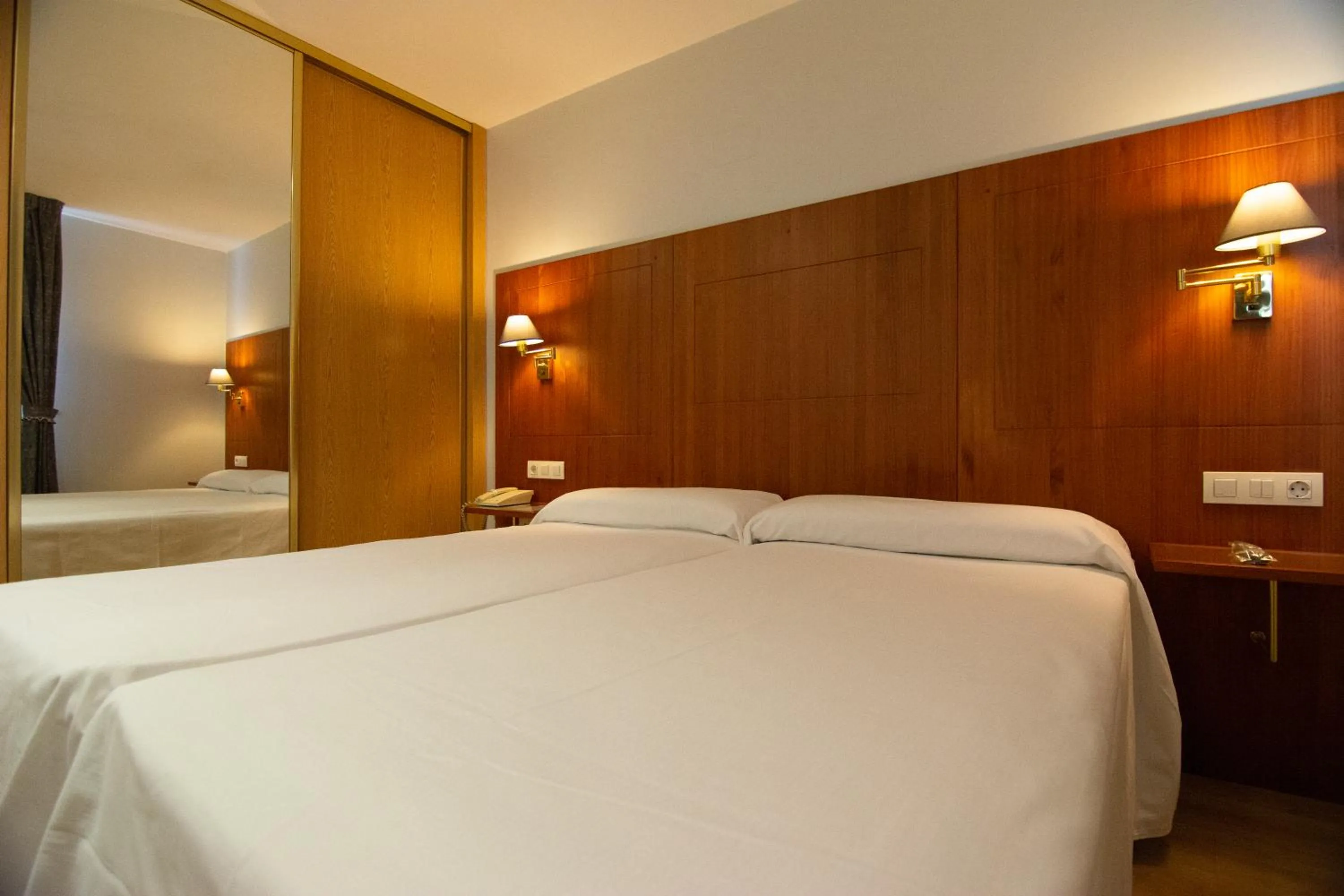 Bed in Hotel Hispania