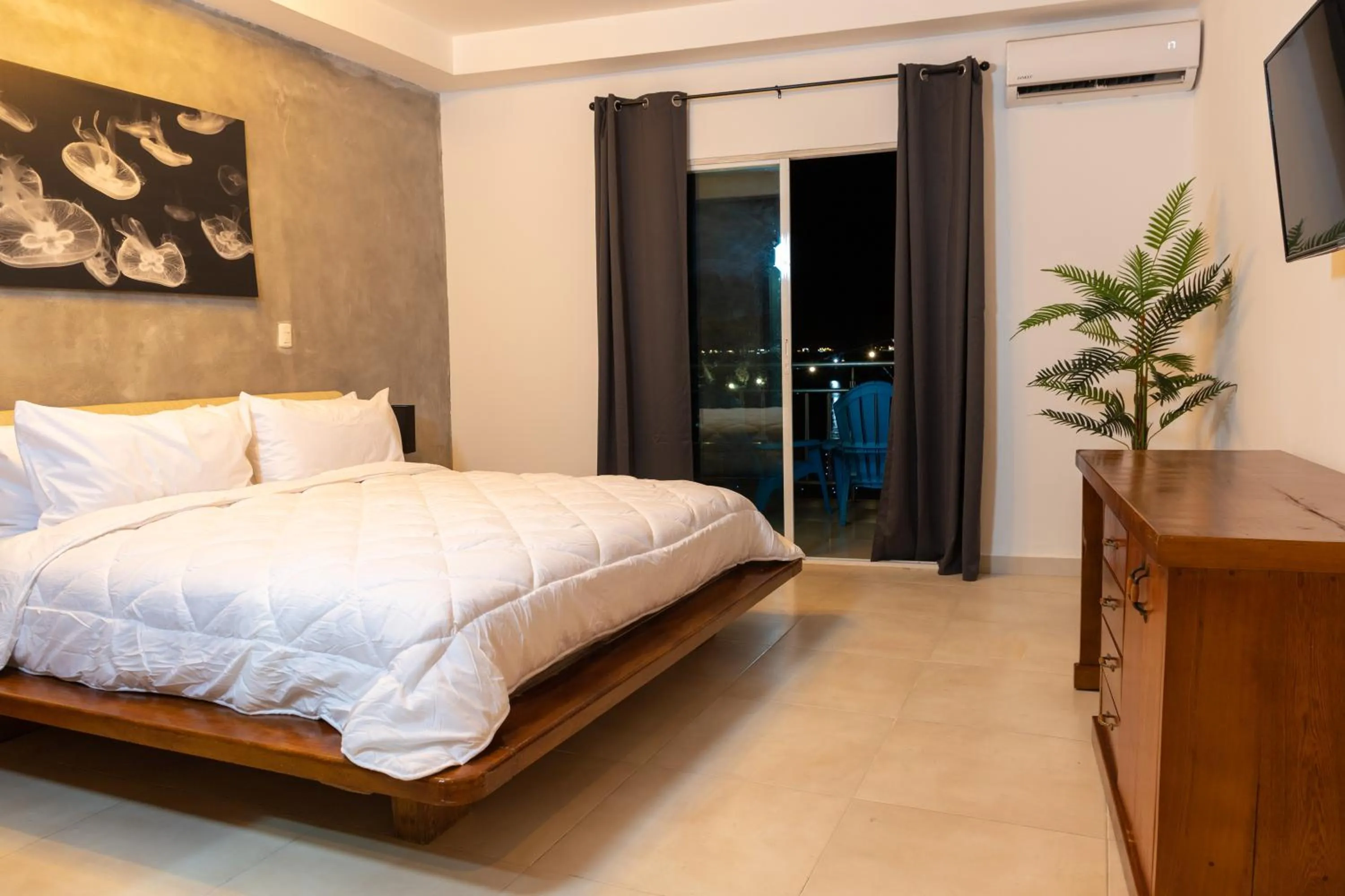 Bed in MARINN Tropical Vibes Hotel