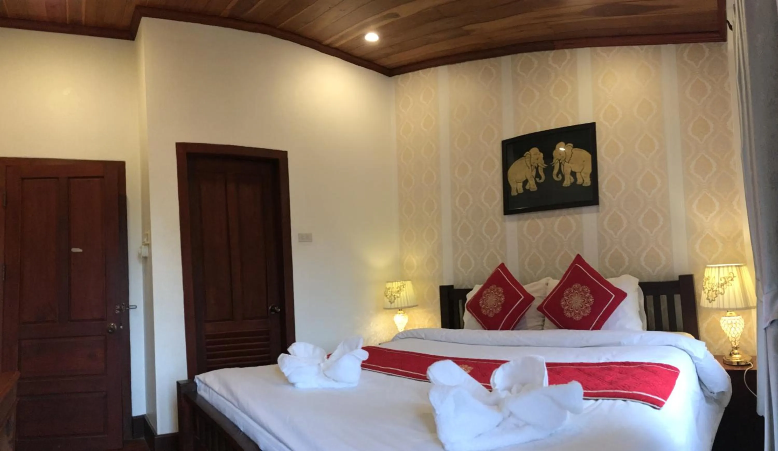 Bed in Luang Prabang Pangkham Lodge