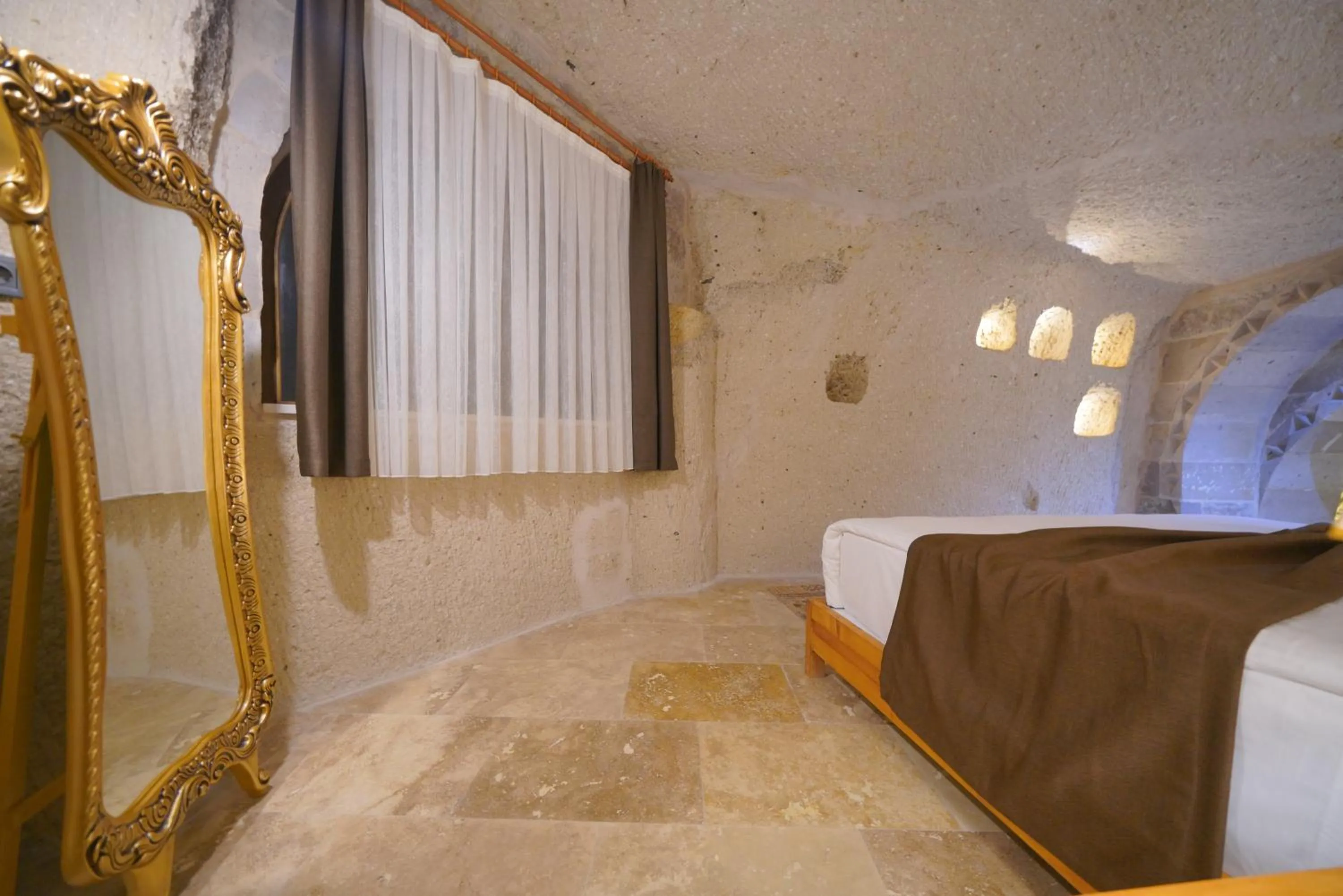 Bed in Cappadocia Secret Hill Cave Suites