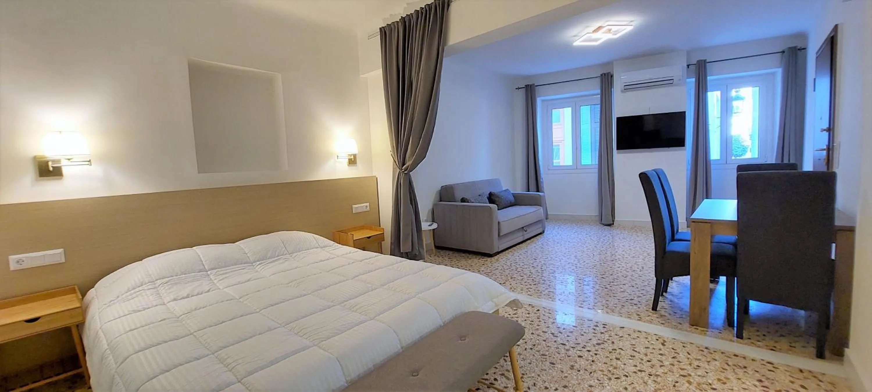 Bed in Athens Plaka Family Suites