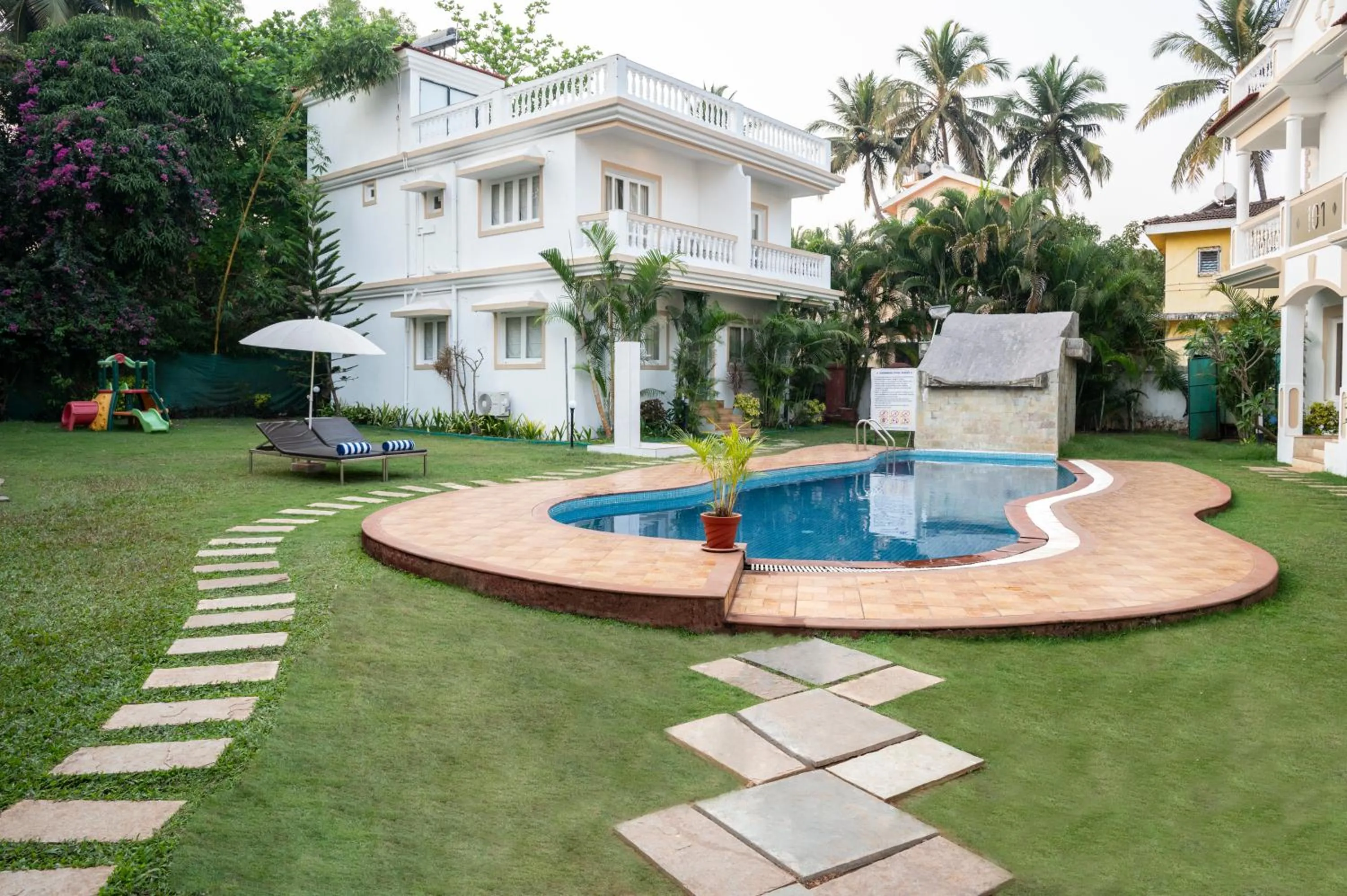 Swimming pool in Richmonde Ananta Elite Luxurious Villa & Apartments,Goa