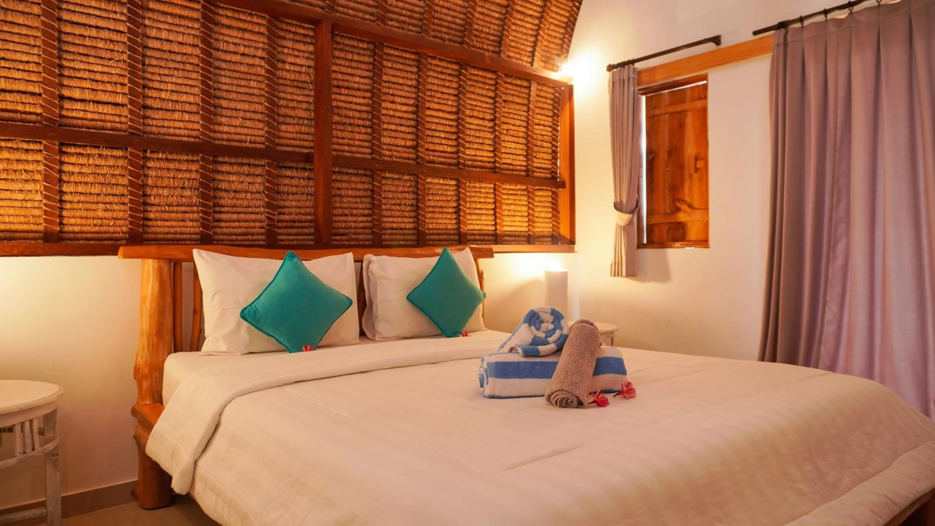 Bed in Kalimaja Amed Villa