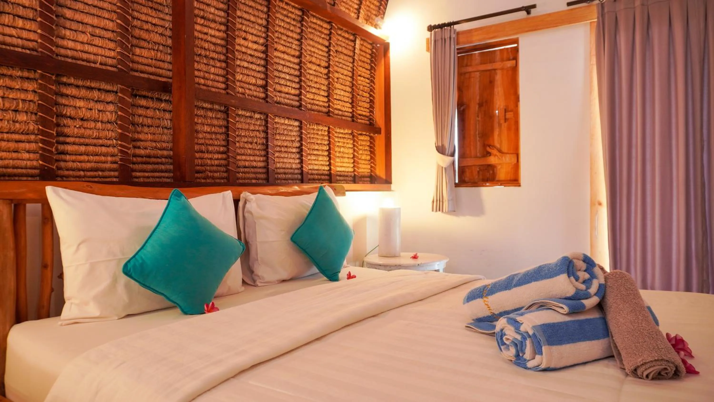 Bed in Kalimaja Amed Villa
