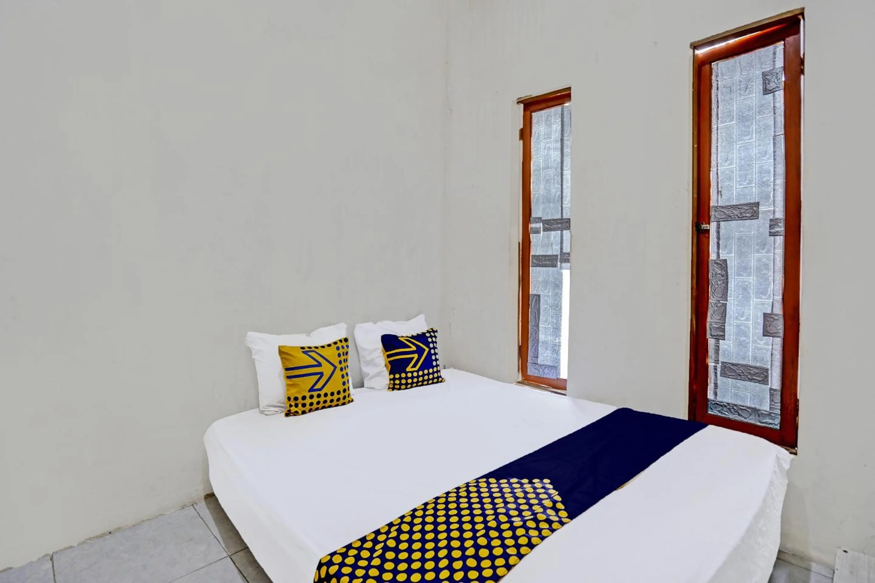 Bedroom, Bed in OYO LIFE 92077 Tarlo Guest House 3