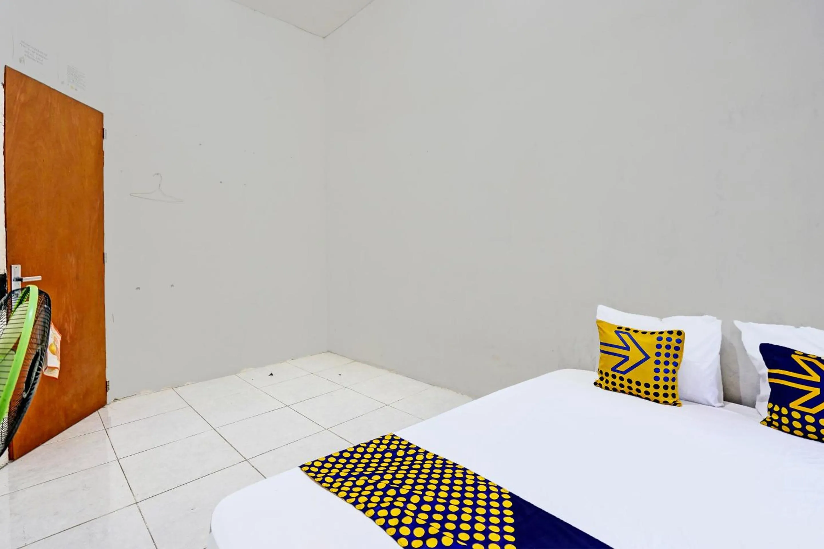 Bedroom, Bed in OYO LIFE 92077 Tarlo Guest House 3