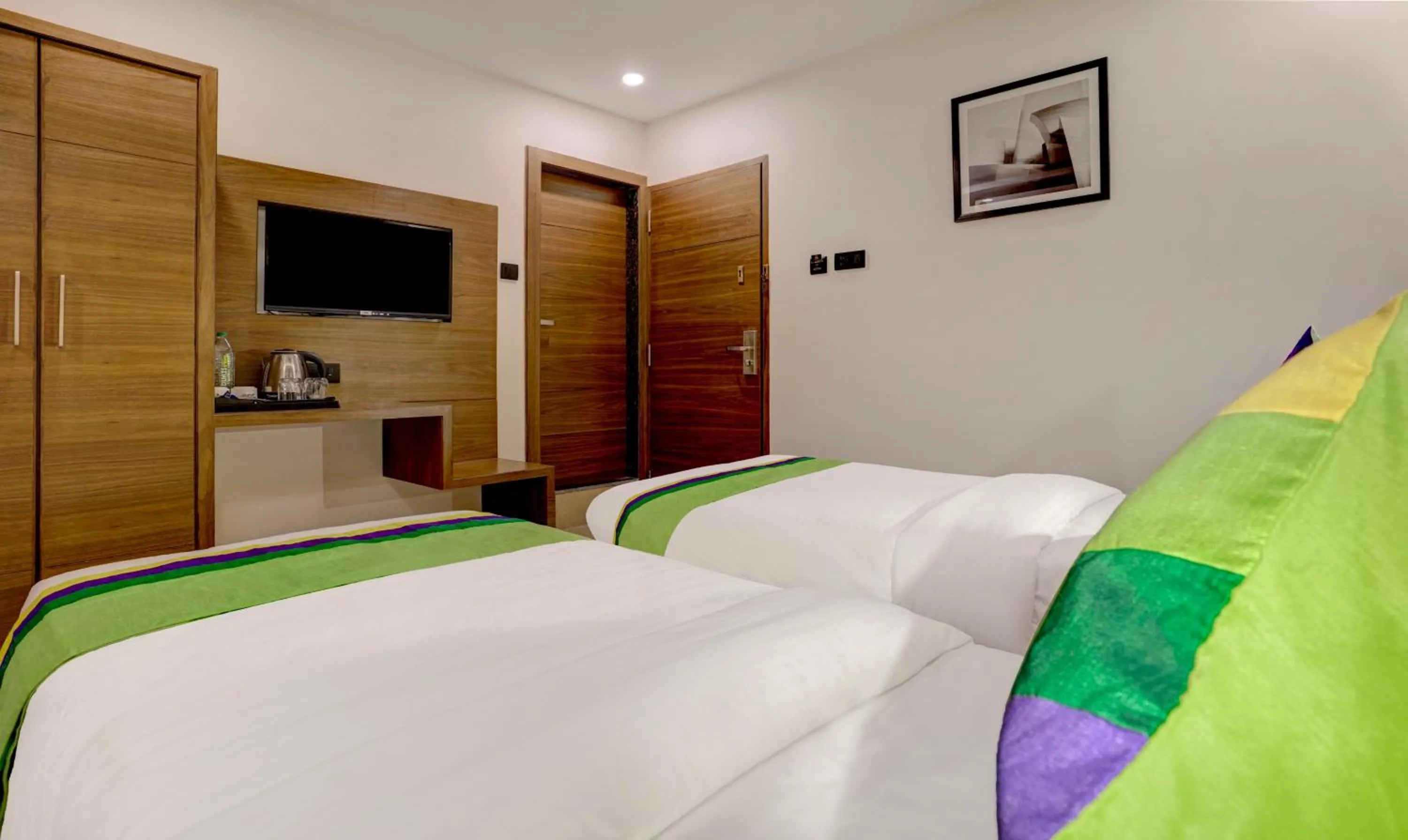 Bedroom, Bed in Treebo Castle Rock Inn