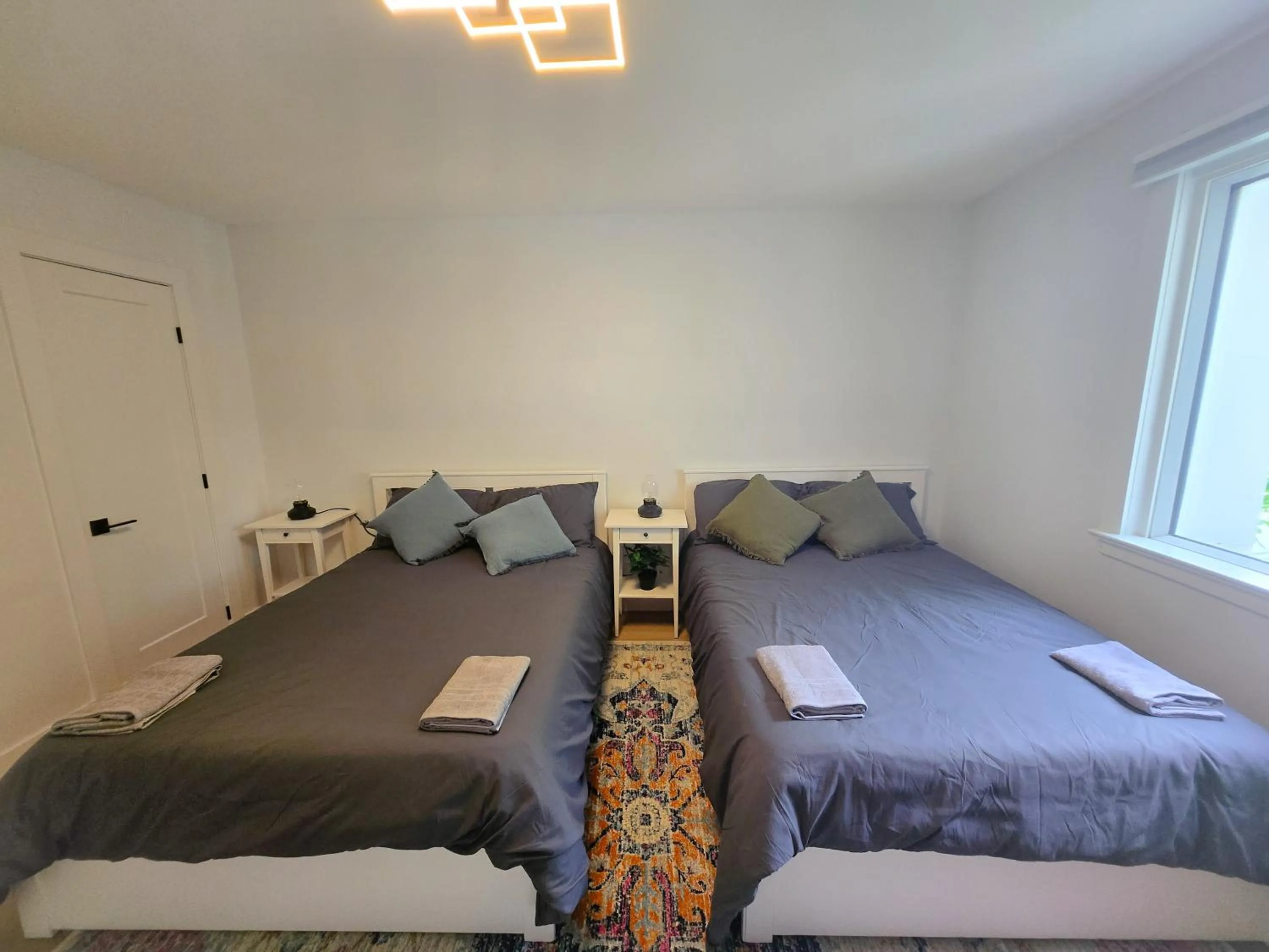 Bed in JstLikeHome - Serenity Suites & Guesthouse