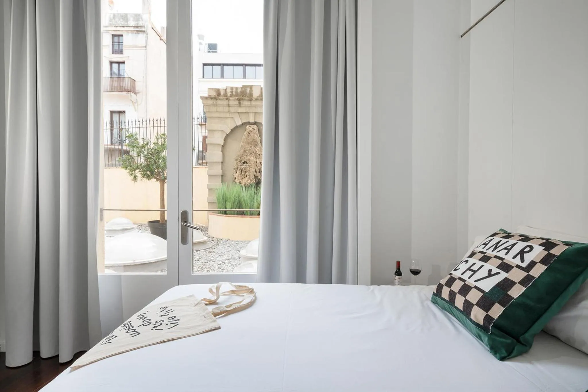 Bed in Chic & Basic Born Boutique Hotel