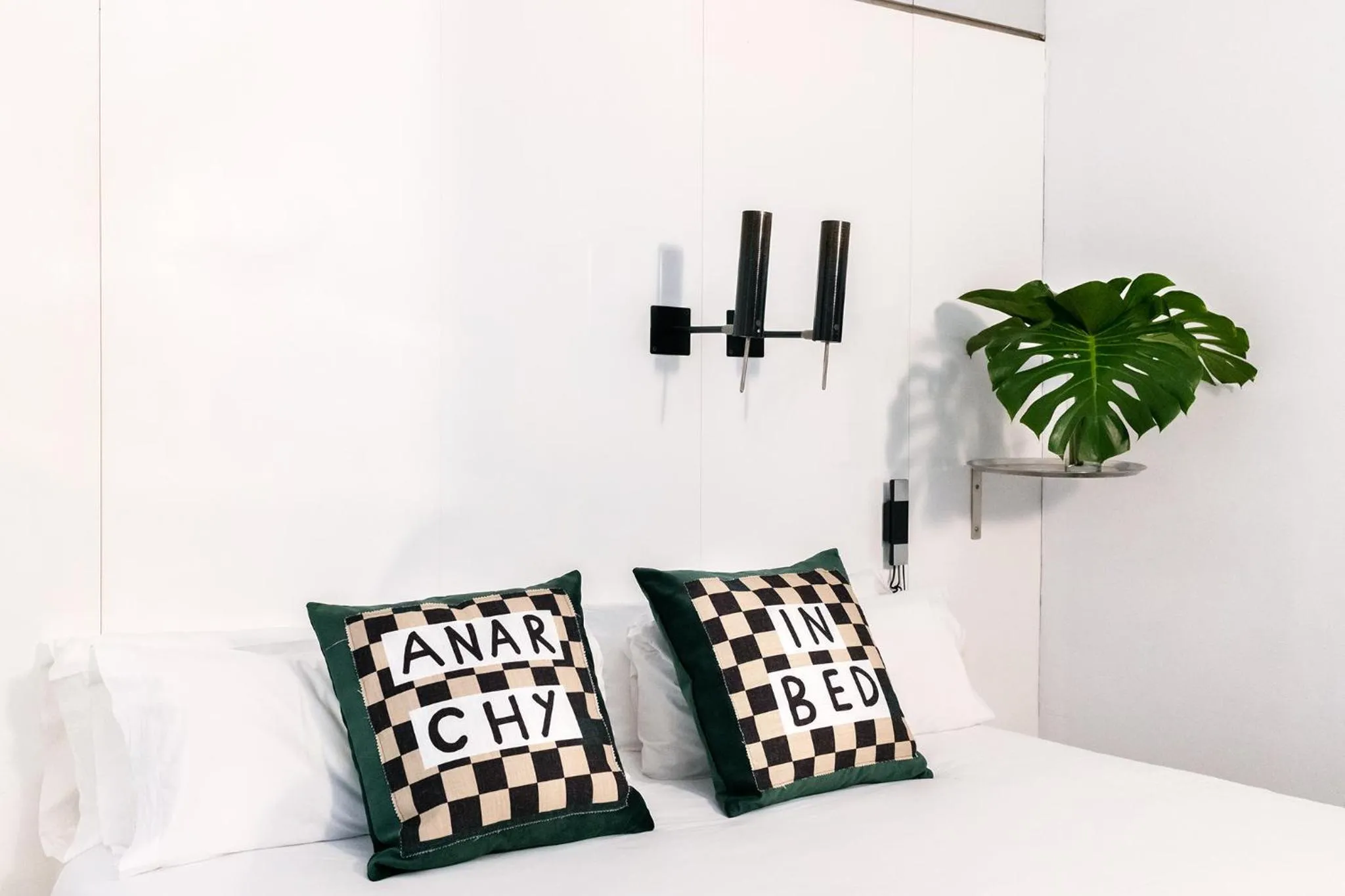 Bed in Chic & Basic Born Boutique Hotel