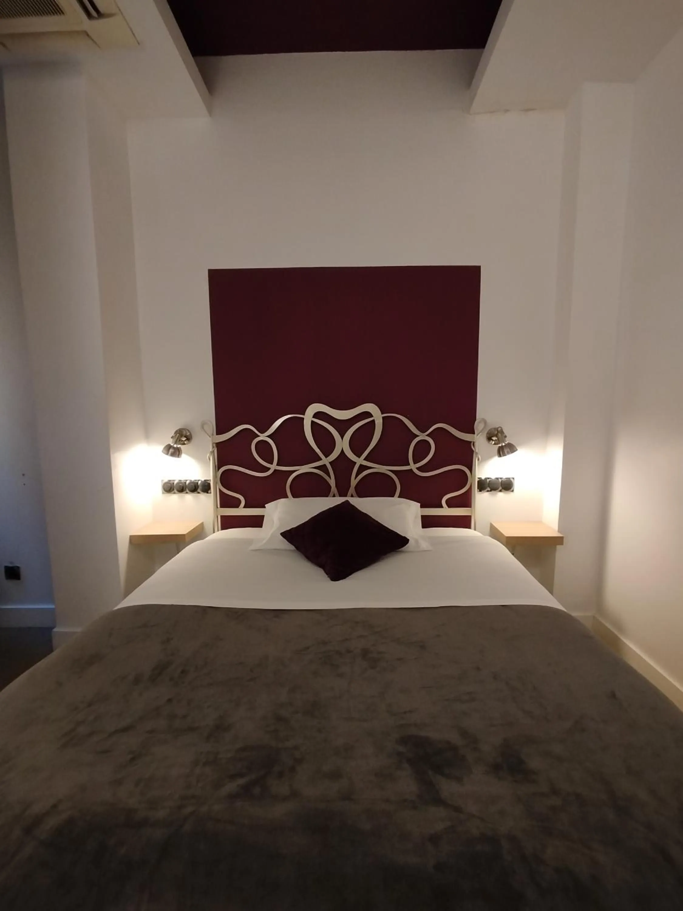 Bed in Hostal Santa Ana Colors